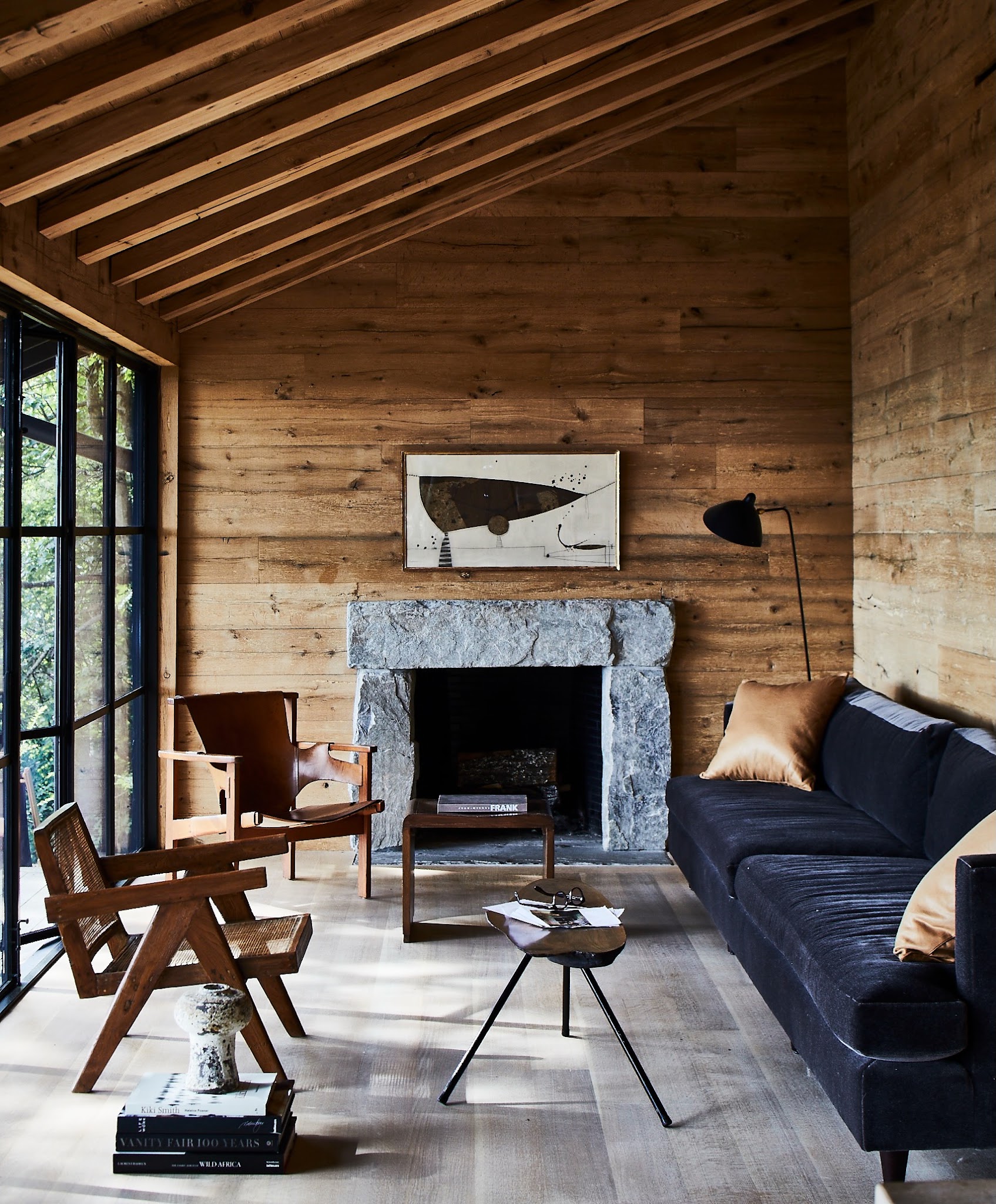 15. Balance Rustic Timber With a Nearly Black Sofa