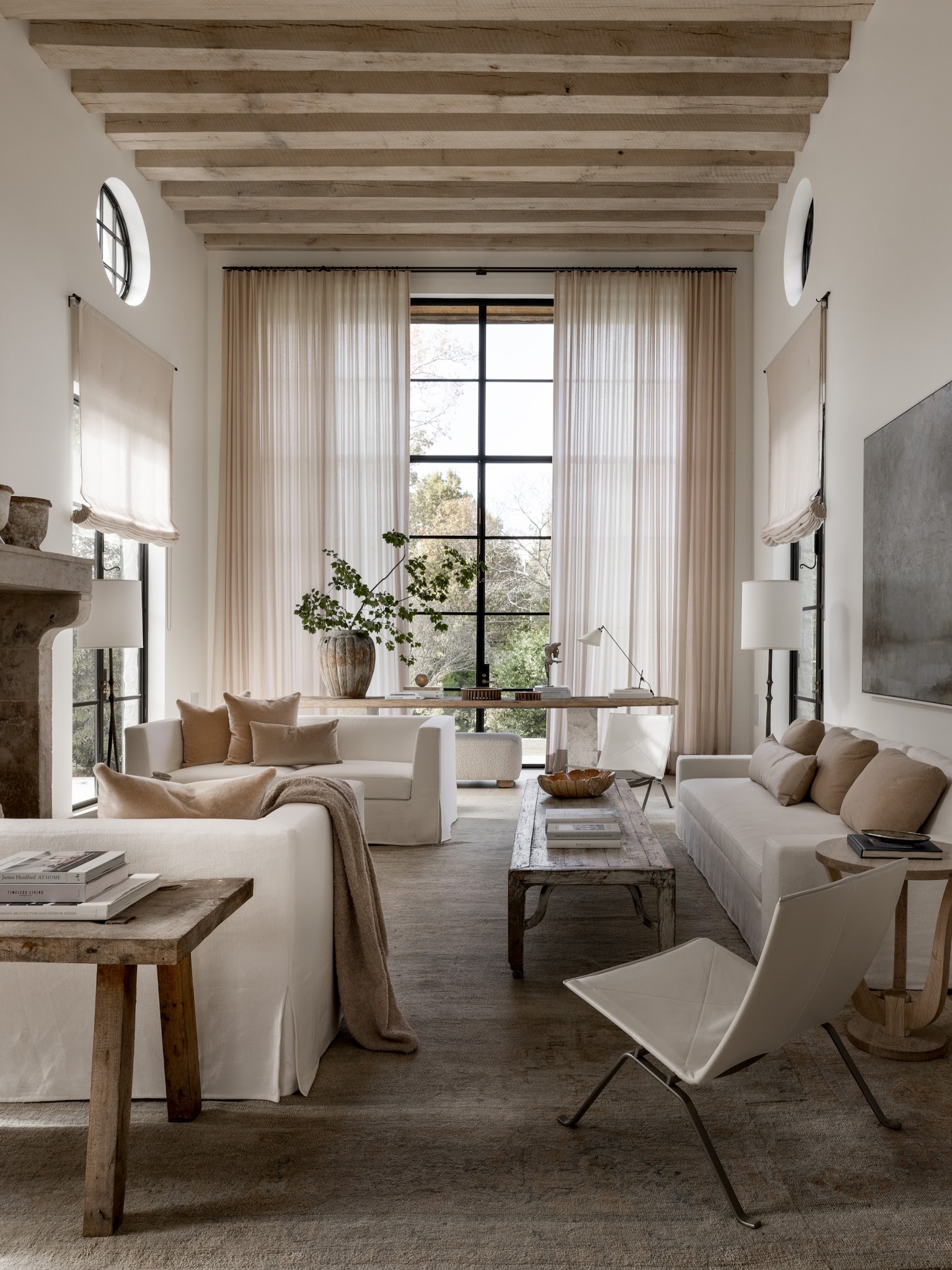 16. Soften a Tall Room With Taupe and Filtered Daylight