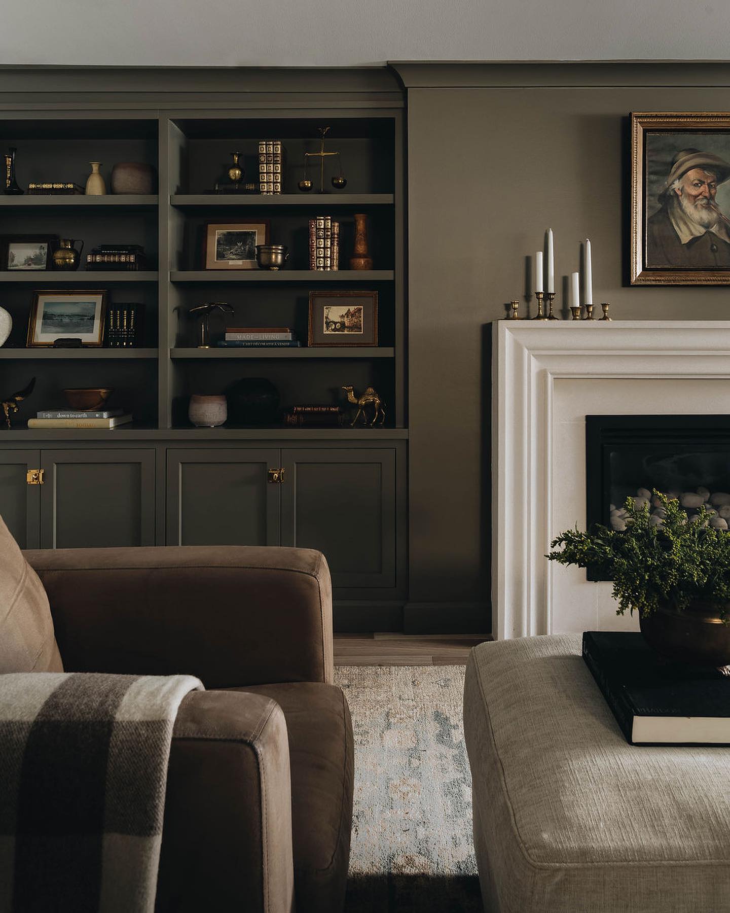 19. Paint Built-Ins a Deep Gray Beside a Pale Fireplace