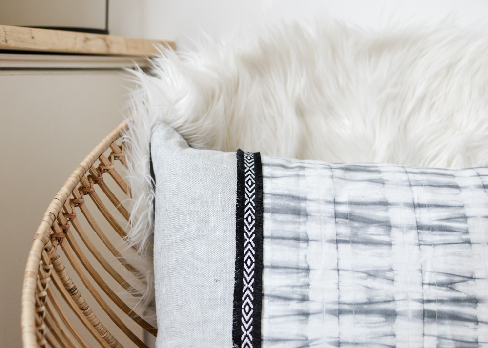 3. Soften a Woven Chair With Contrasting Pale Fabrics