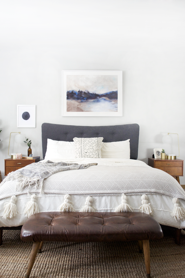 9. Let Oversized Tassels Finish a Simple Bed