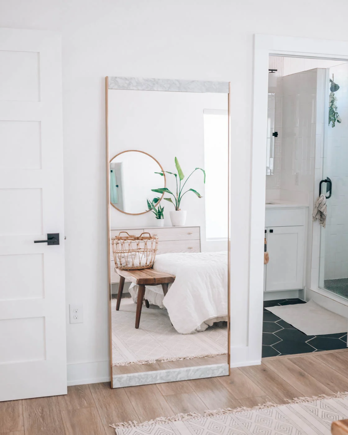 13. Use a Tall Mirror to Repeat Wood and Greenery