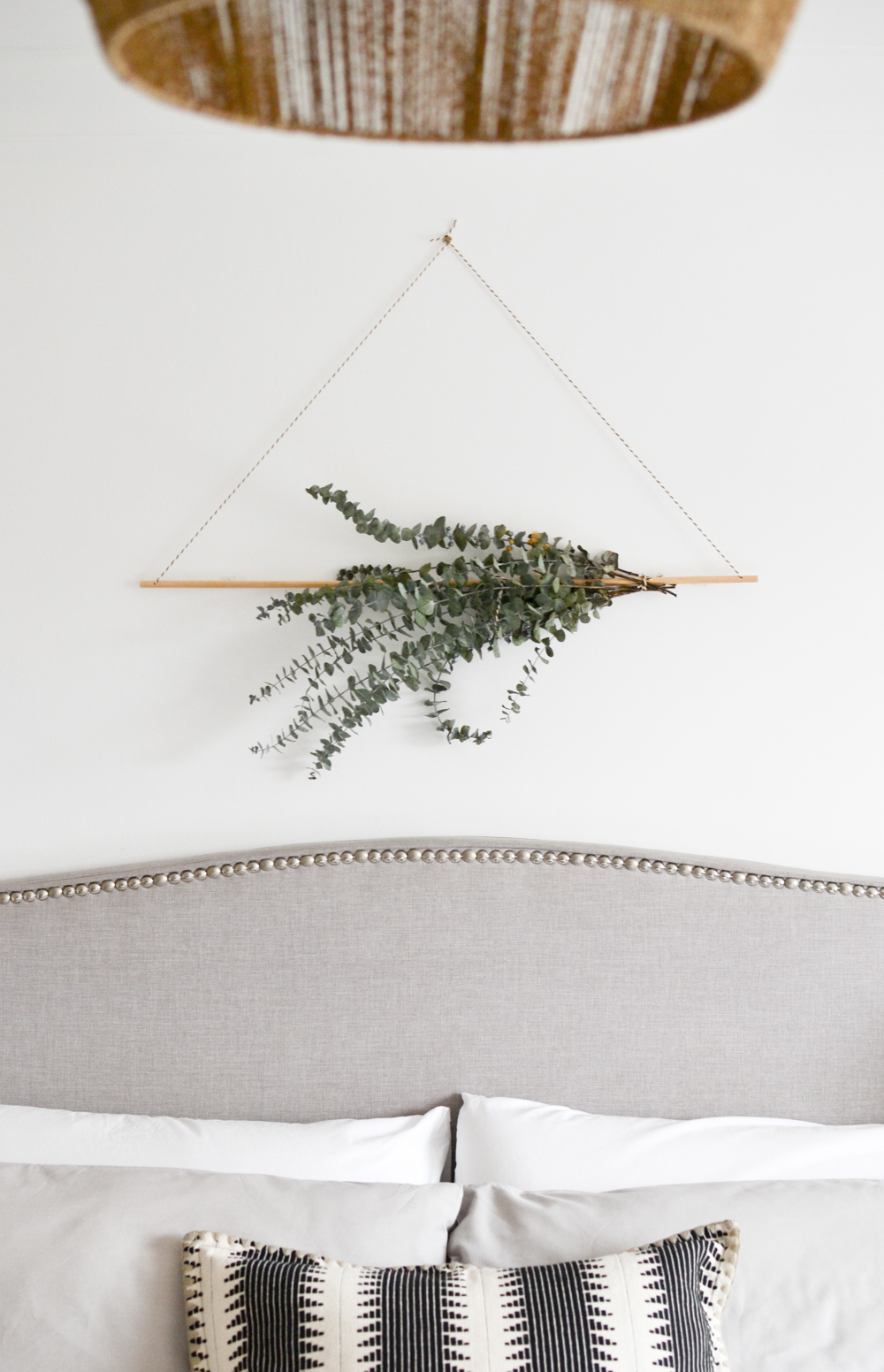16. Hang a Simple Bundle of Foliage Above the Headboard