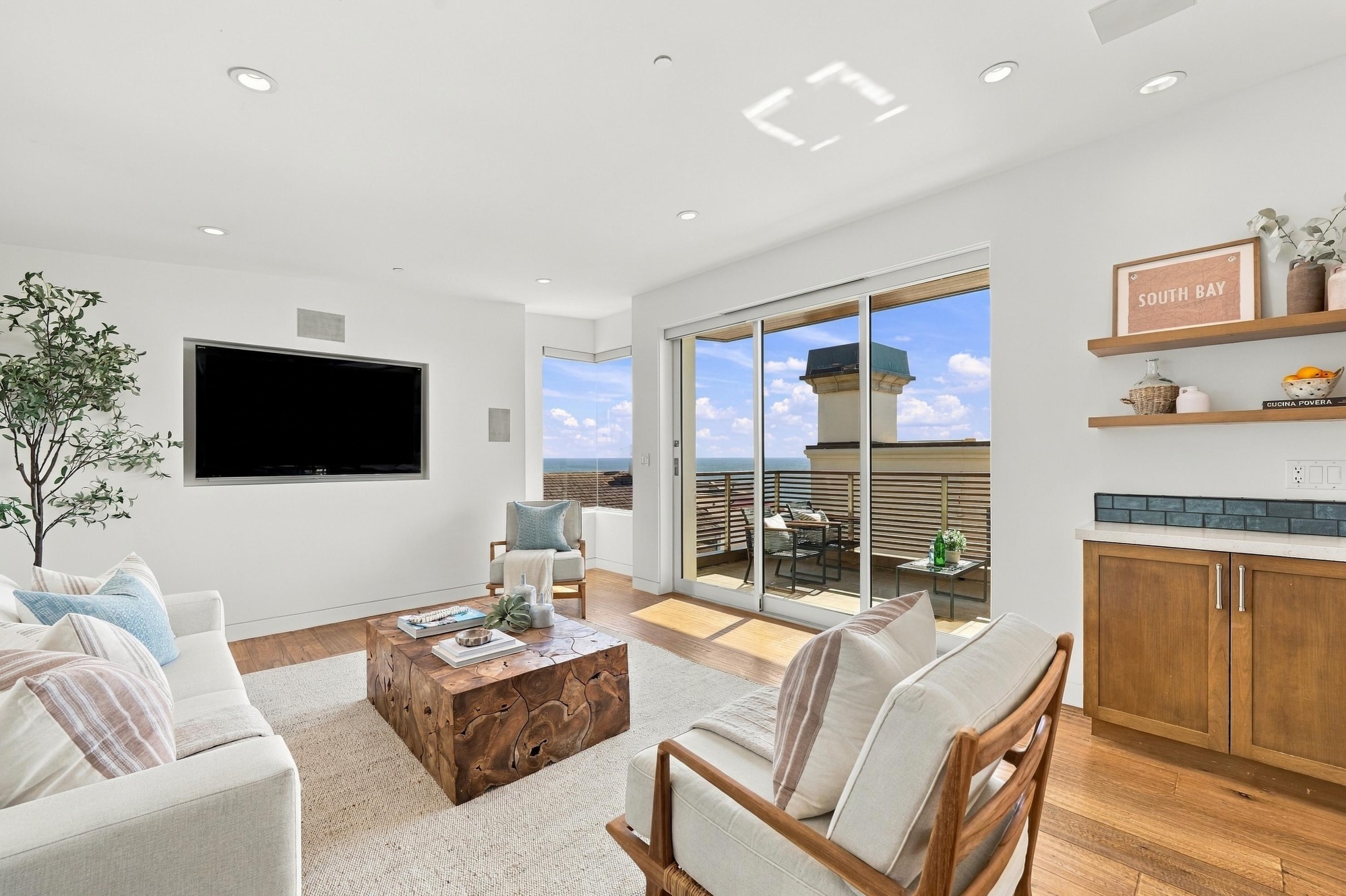 8. Balance the TV With a Warm Display Area
