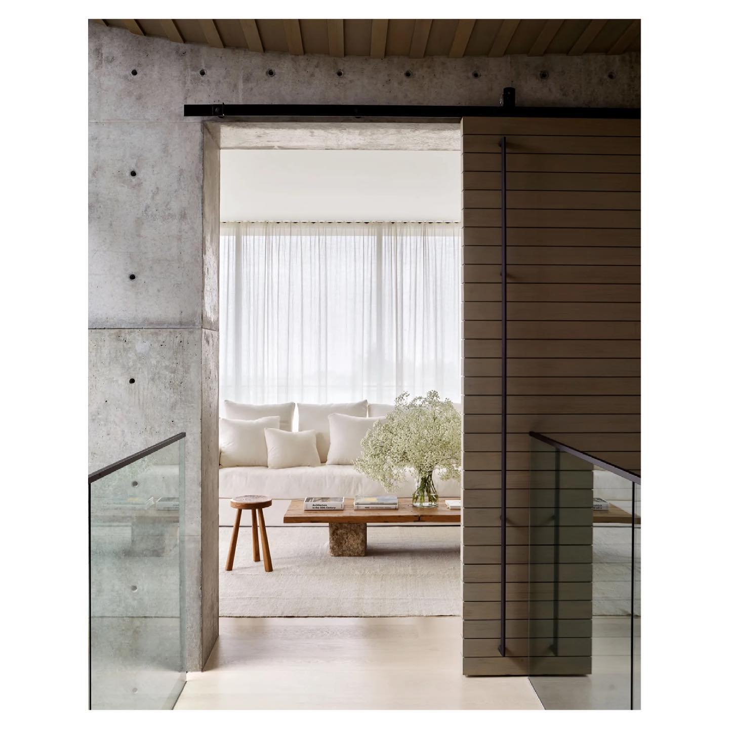 10. Frame Pale Seating With a Timber Sliding Door