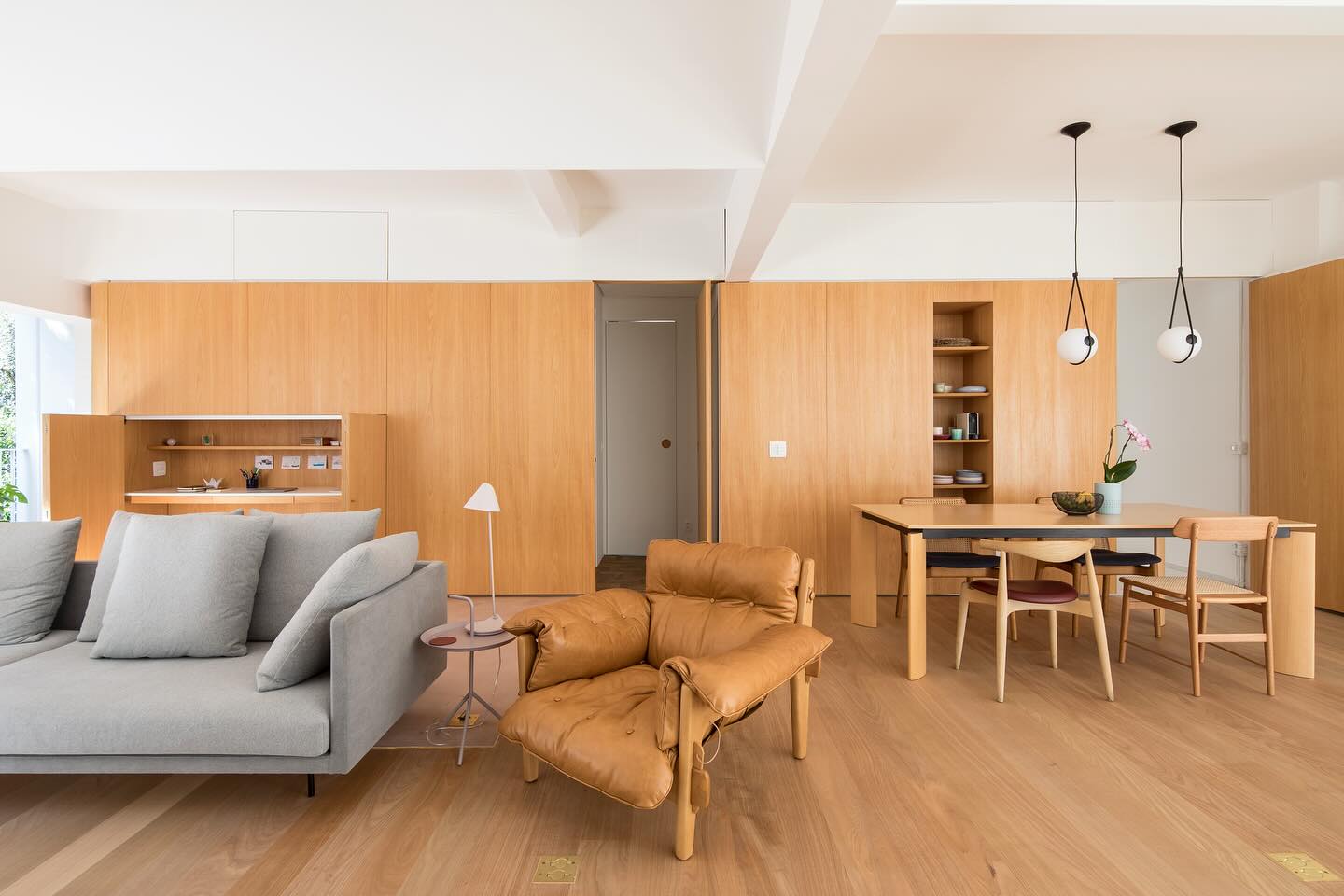 17. Let One Storage Wall Serve the Whole Room