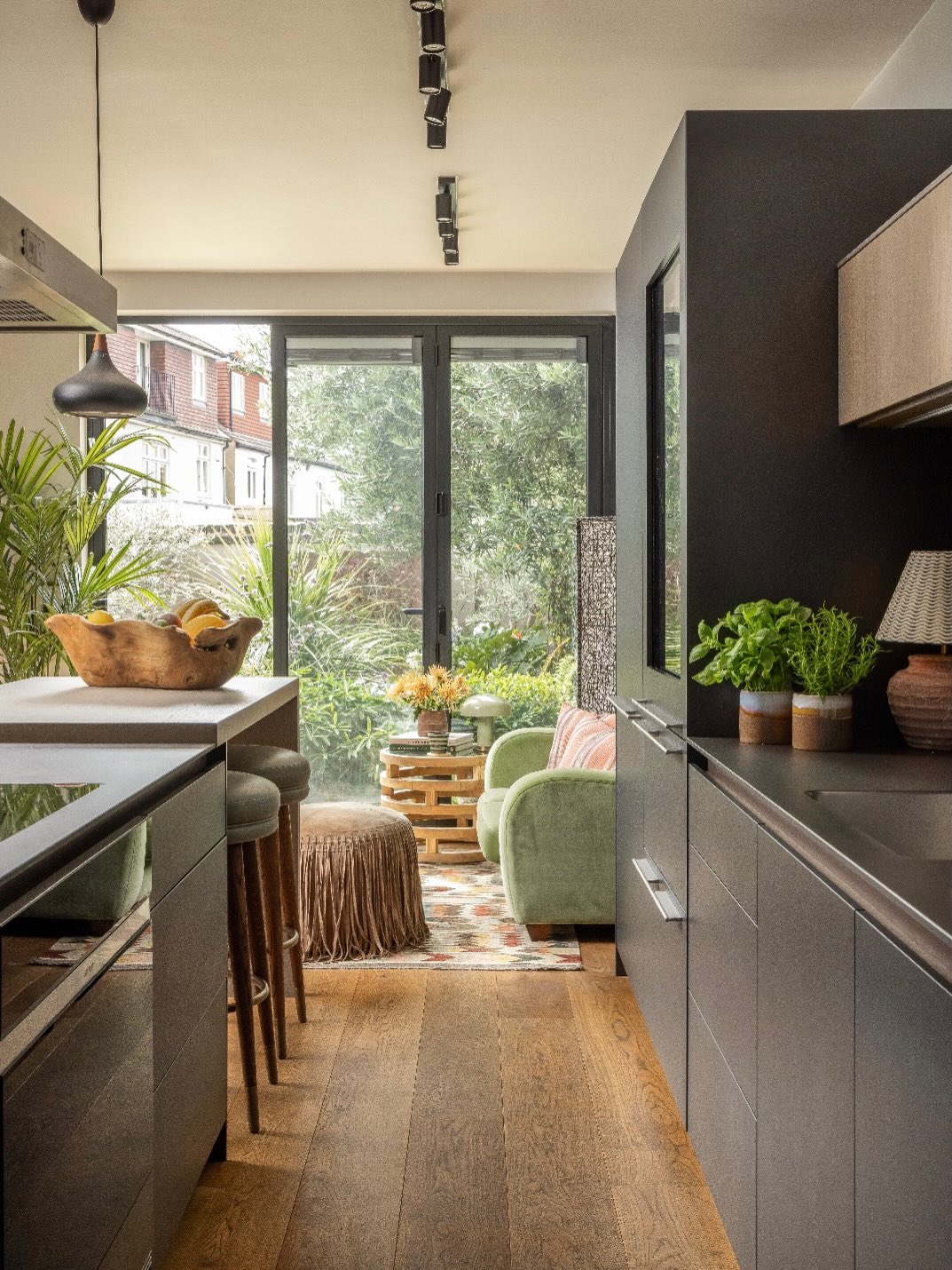 18. Add a Small Lounge at the End of a Kitchen