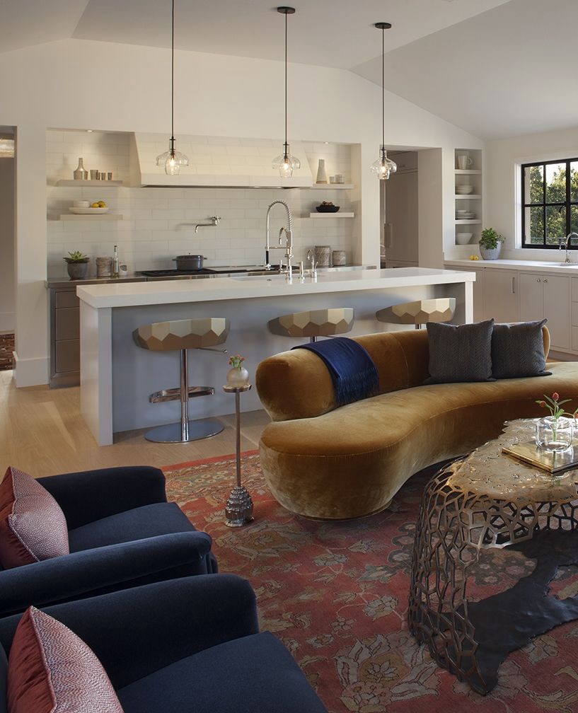 19. Soften the Kitchen Edge With a Curved Sofa