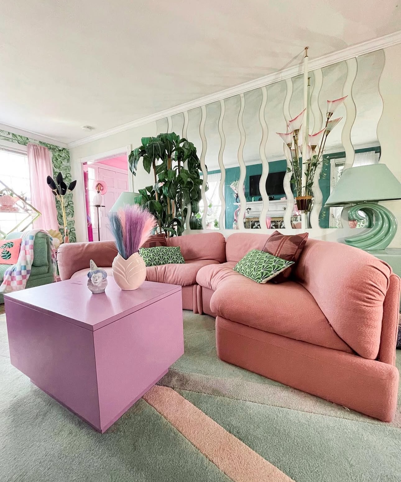 2. Mix a Curved Pink Sofa With Mint Accessories