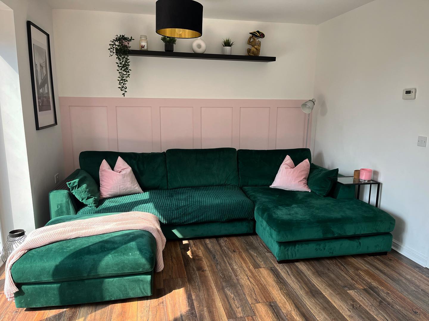 17. Put Pink Paneling Behind an Emerald Sectional