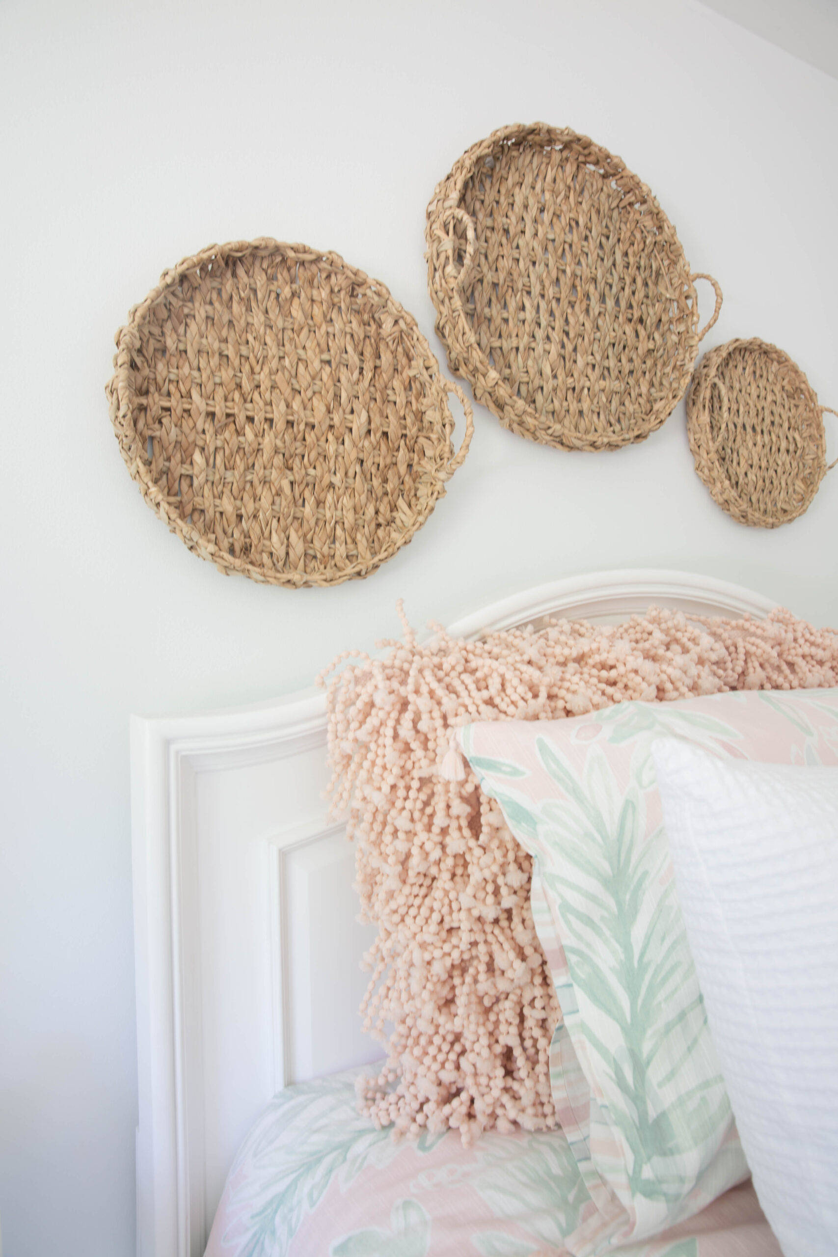 8. Frame Pink Pillows With Woven Wall Trays