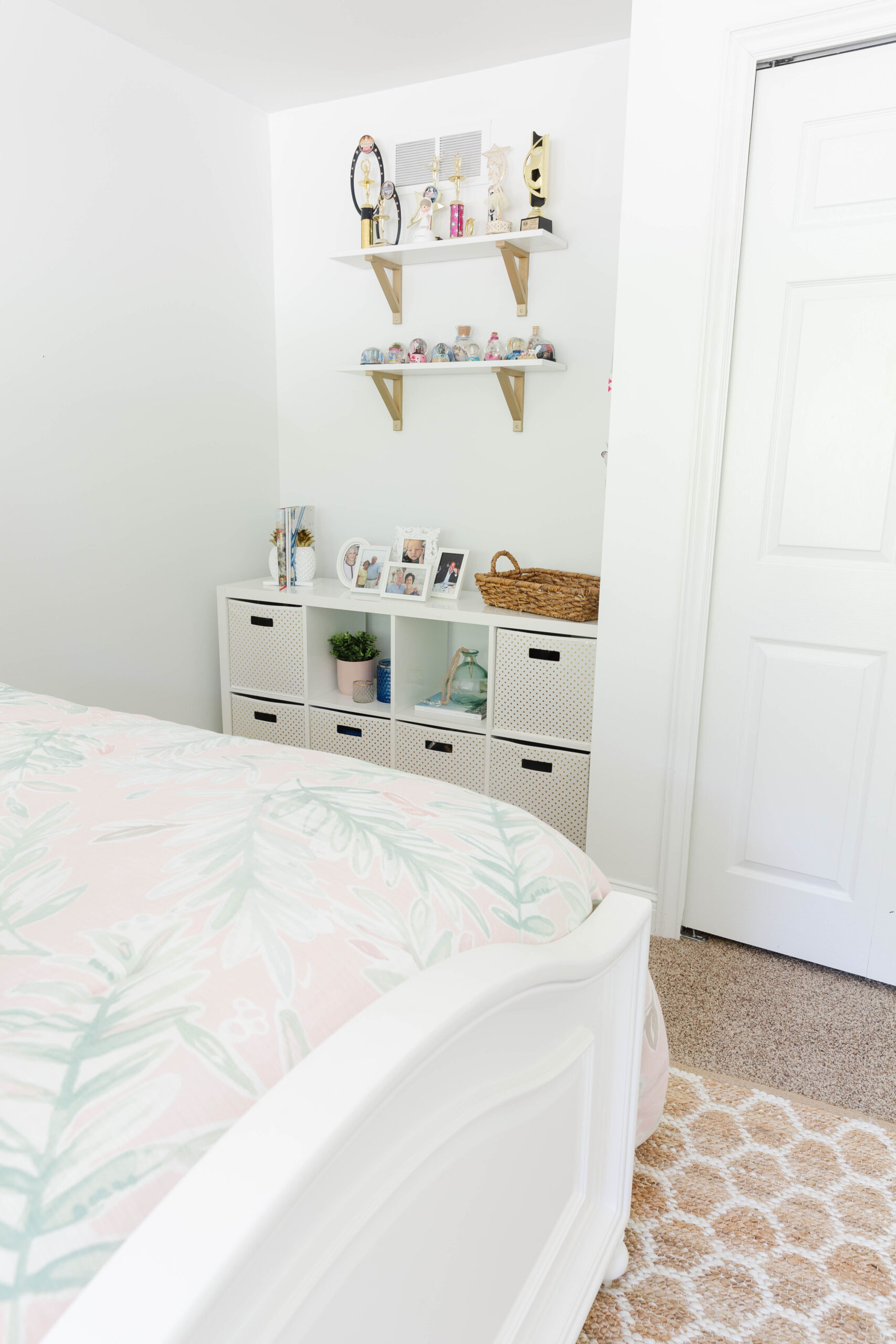 19. Organize a Pink Palm Bedroom With Pale Storage Cubes