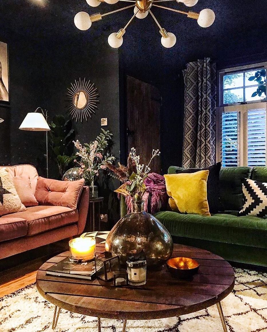 15. Warm a Dark Lounge with Rose Upholstery
