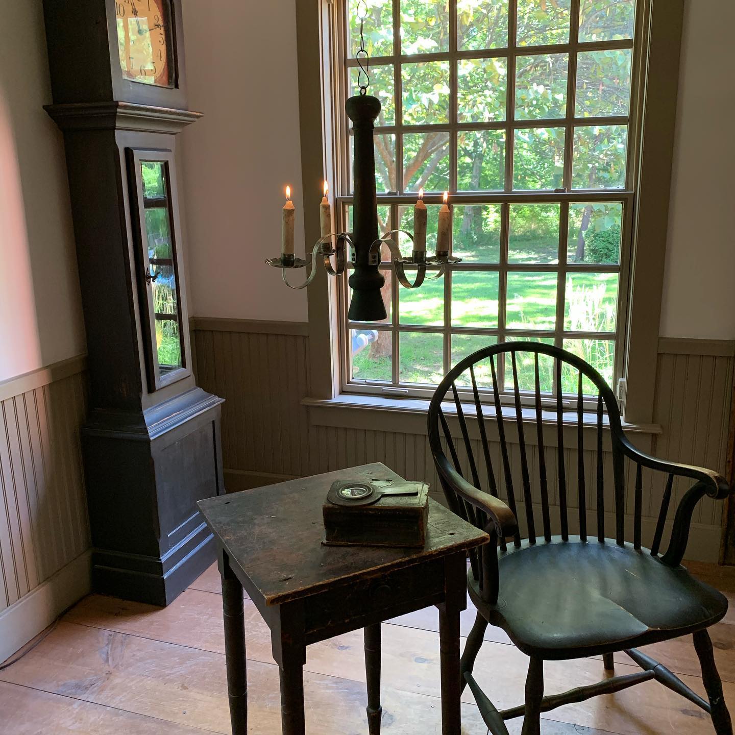 19. Pair a Spindle Chair with a Handmade Chandelier