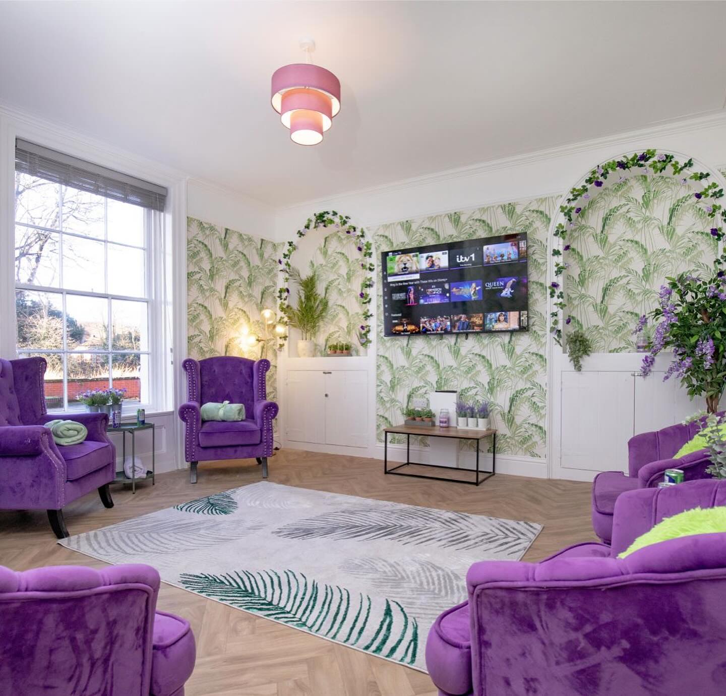 8. Combine Violet Chairs with Leafy Wallpaper
