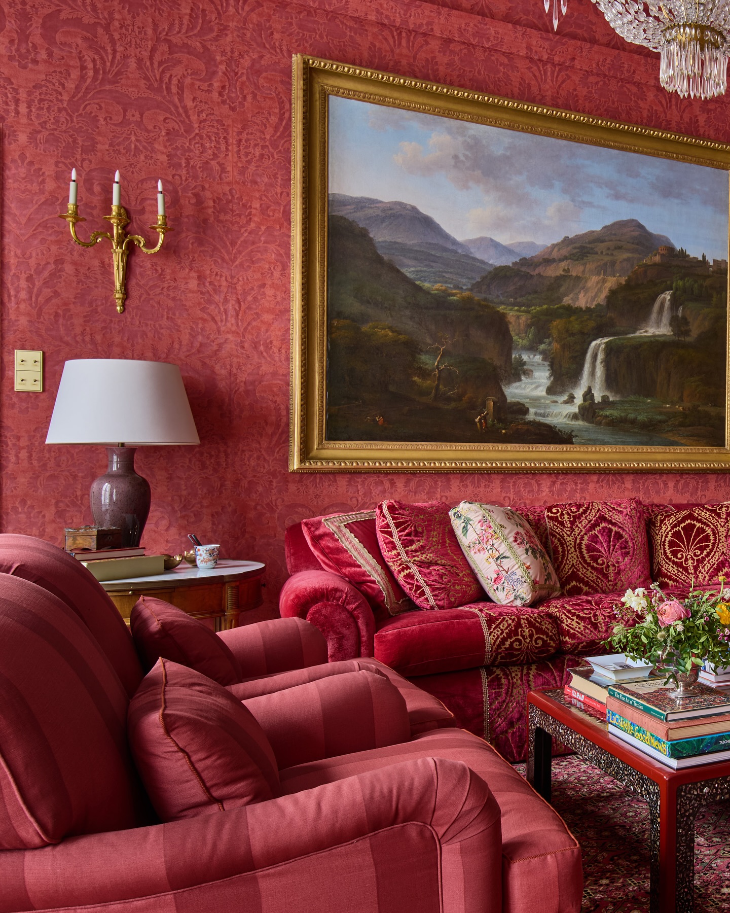 2. Layer Red Upholstery Against Patterned Walls