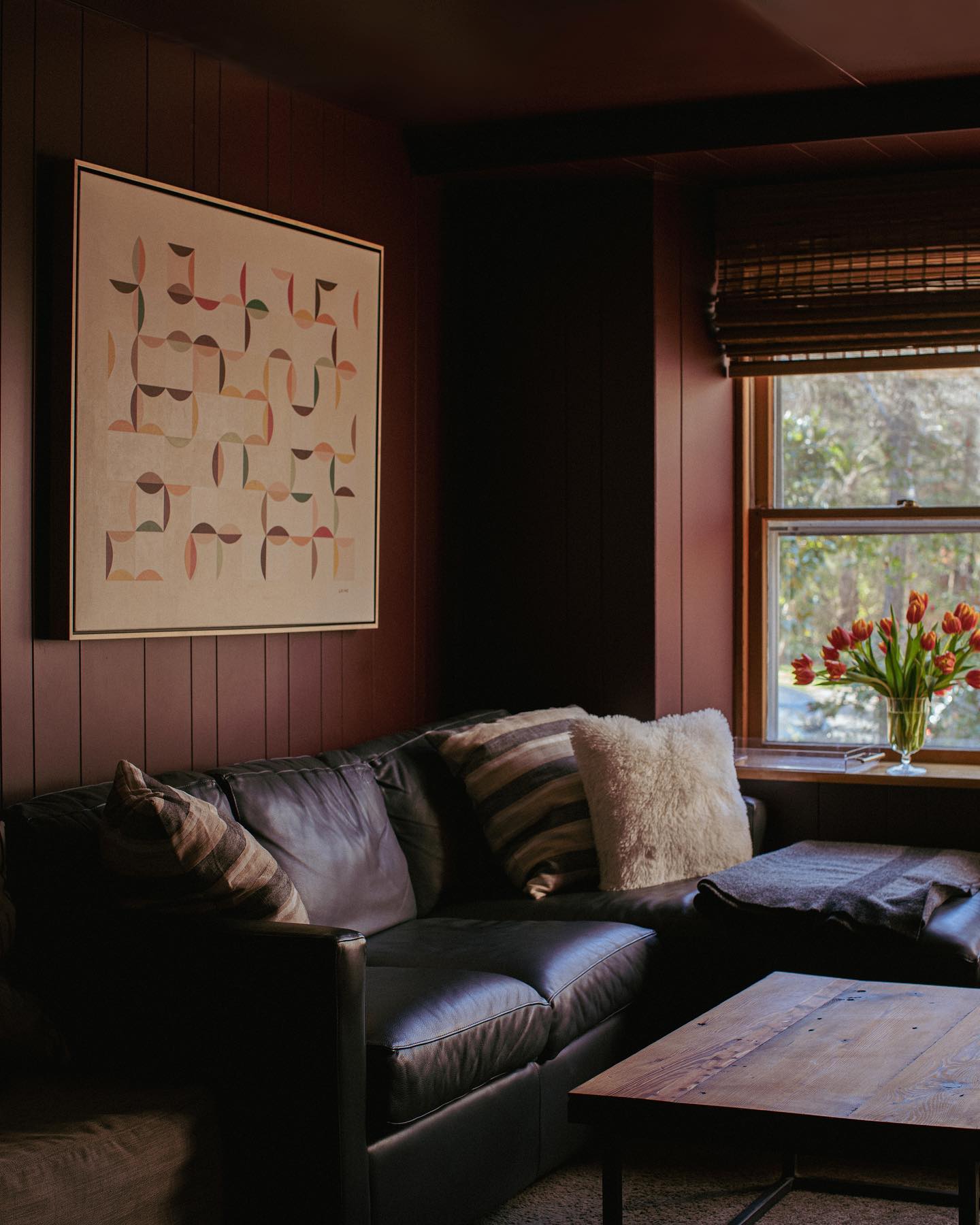 8. Use Burgundy Paneling for a Quiet Den
