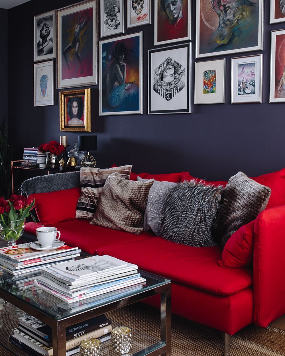 19. Build a Dark Gallery Wall Above Red Upholstery