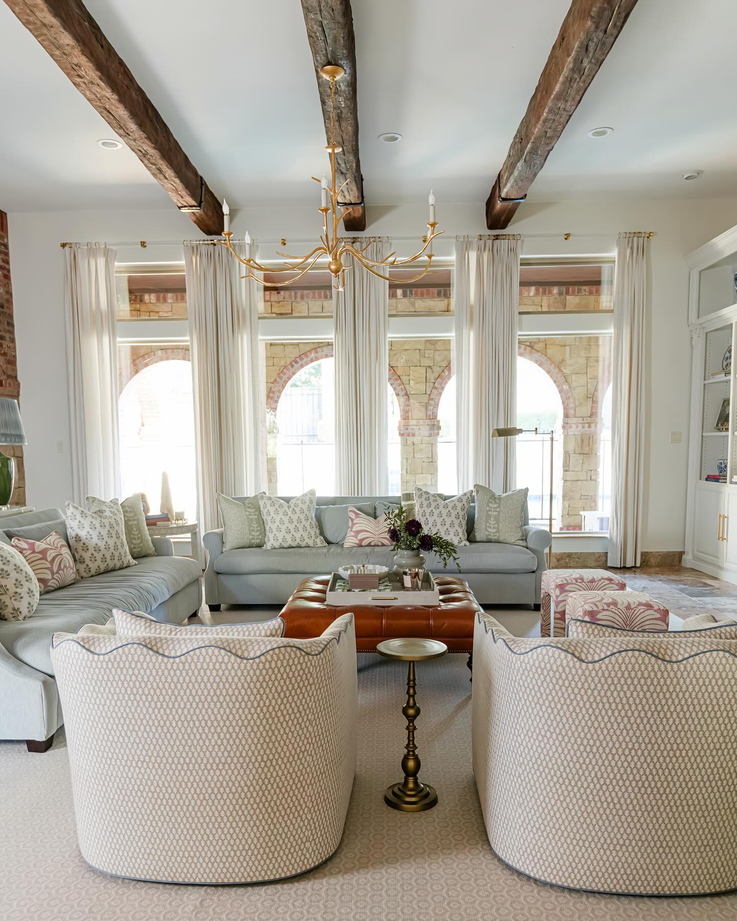 2. Soften Heavy Beams with Pale Upholstery