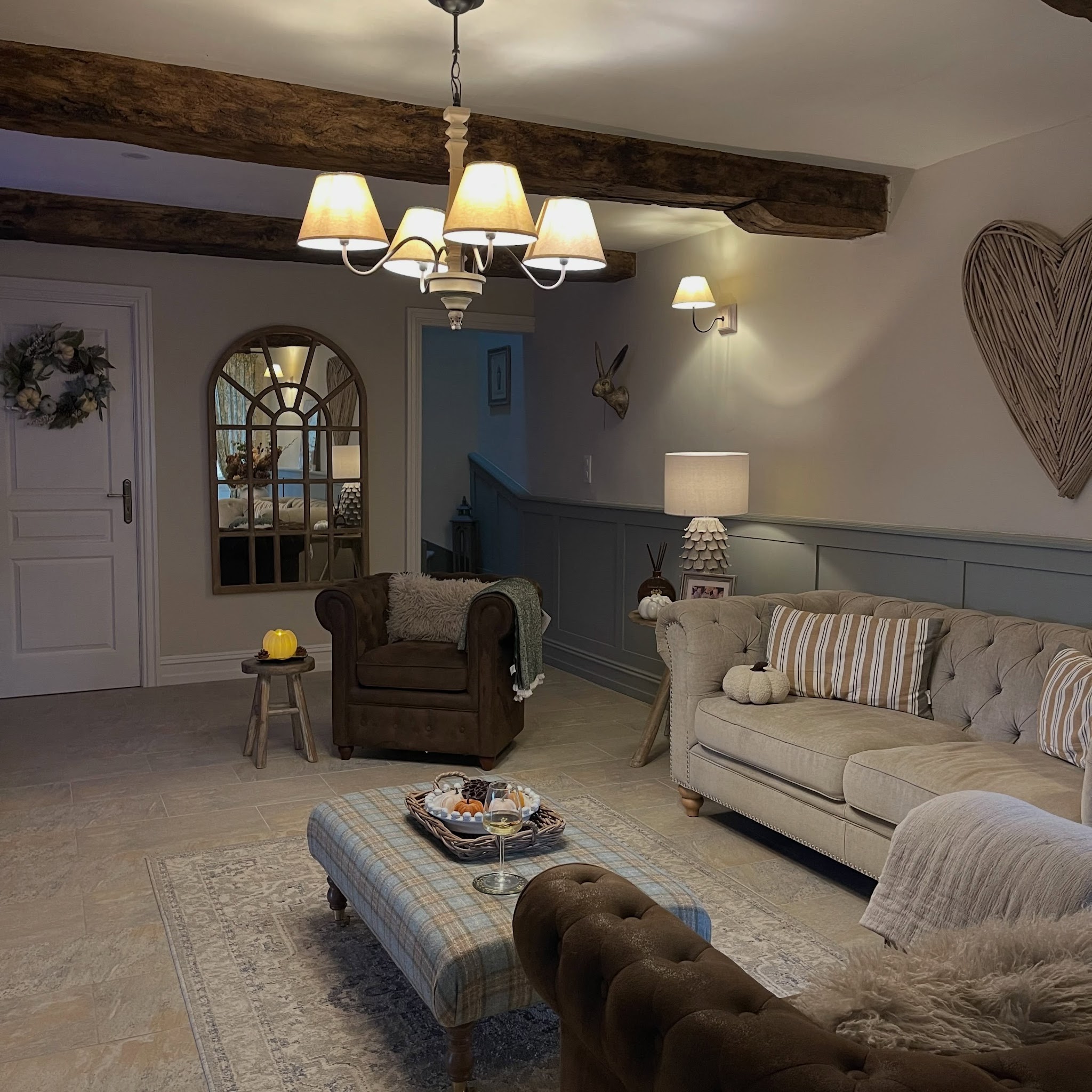 3. Ground a Cozy Room with Blue Gray Paneling