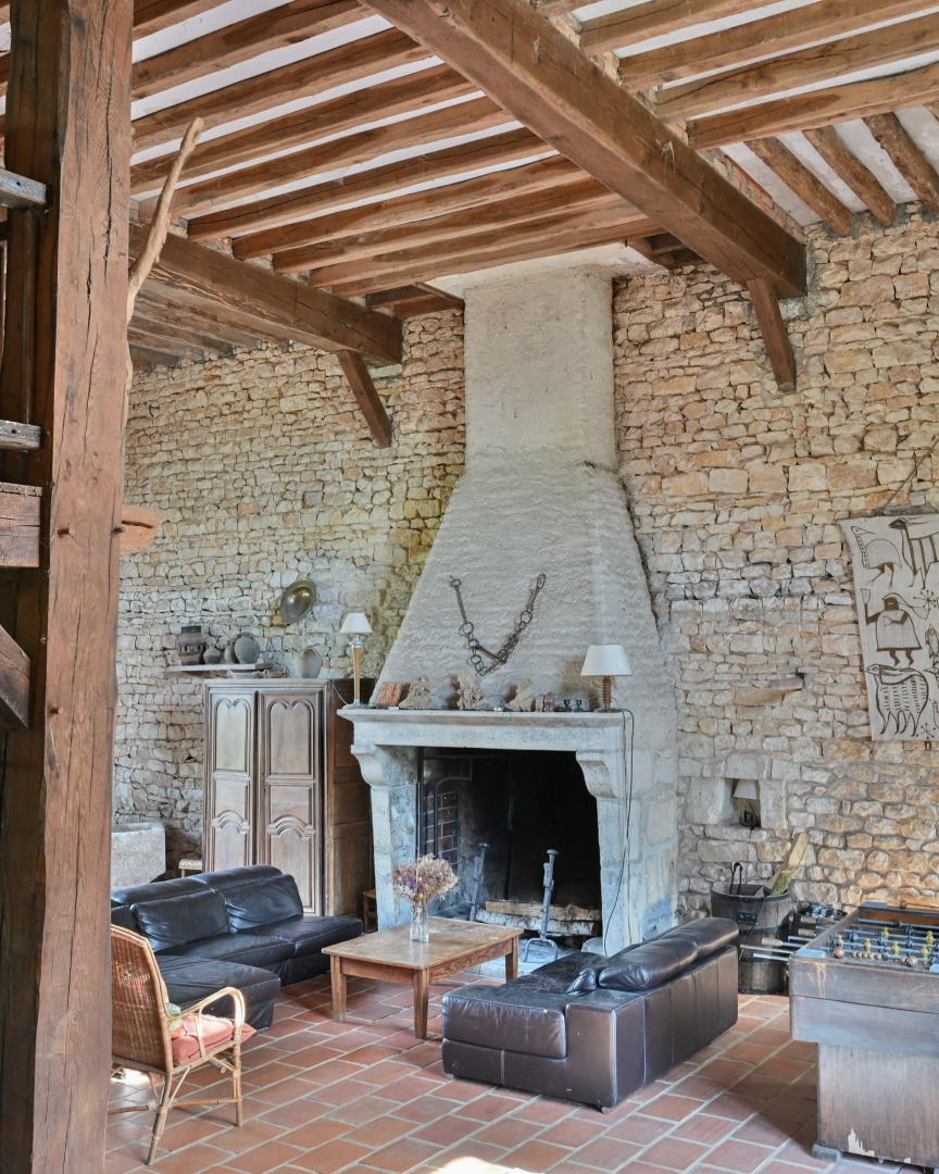 7. Let a Tall Hearth Set the Room’s Scale