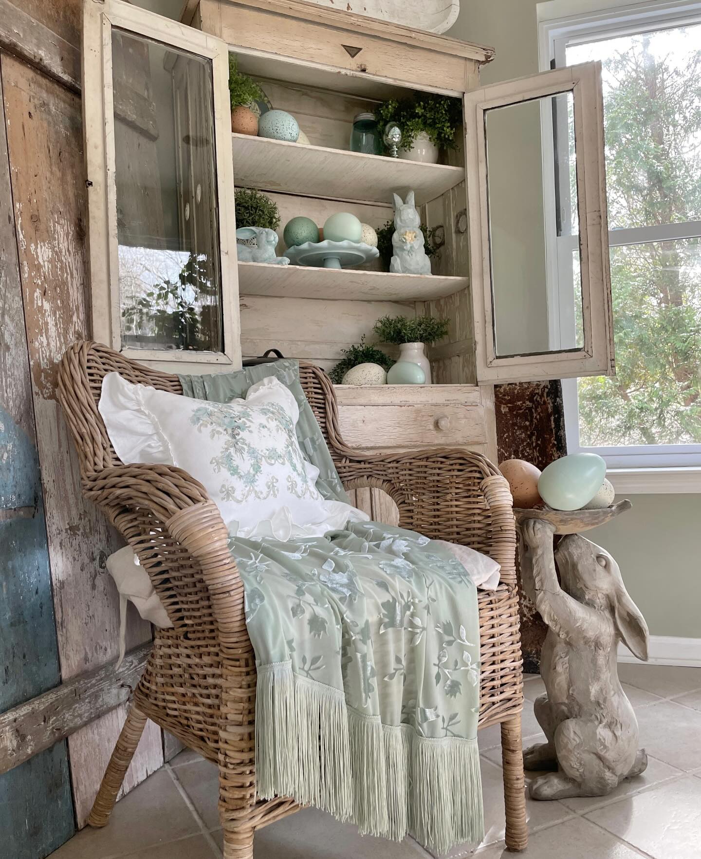 13. Bring Worn Painted Storage into a Seating Corner