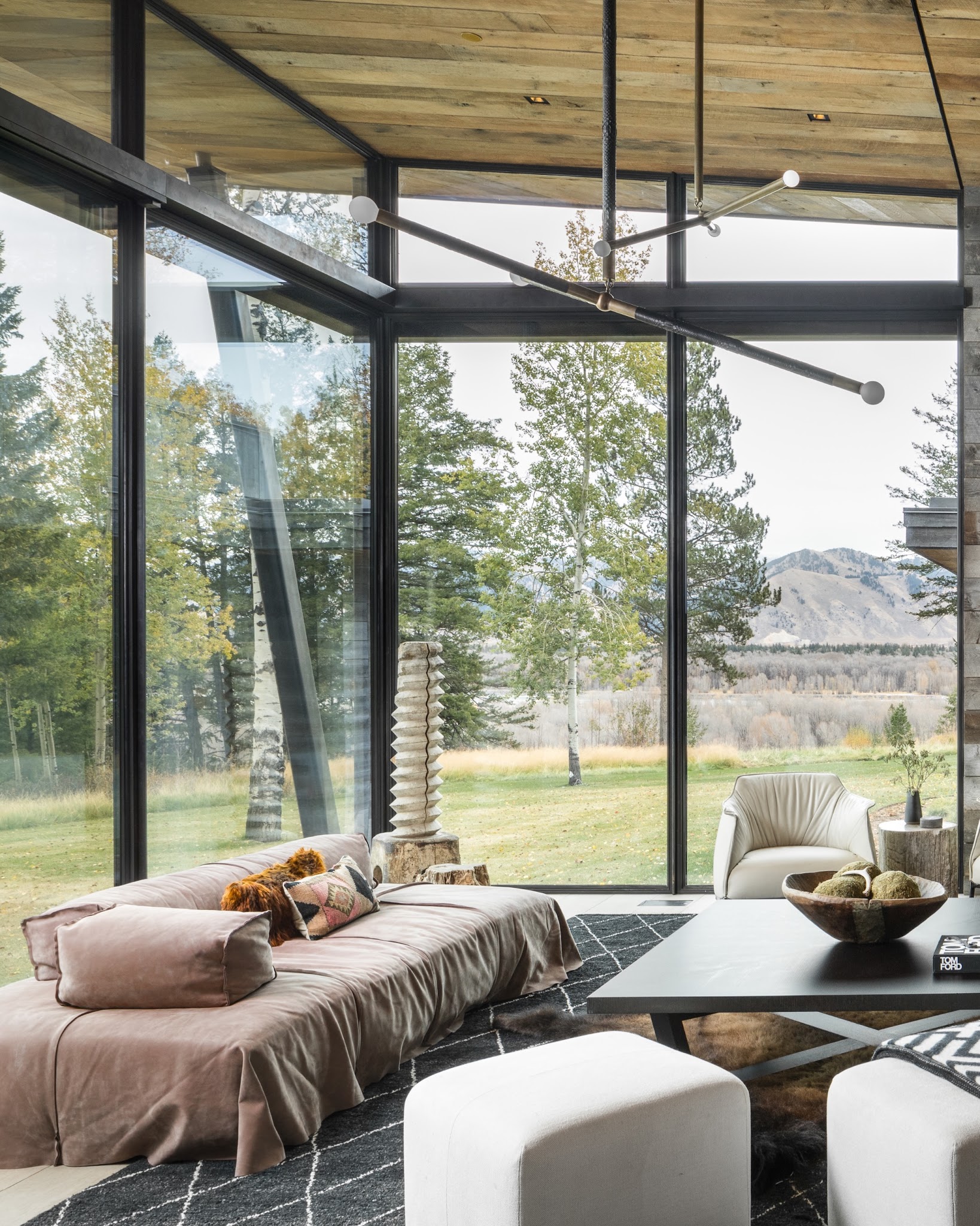 4. Soften a Glass Corner With Relaxed Covered Seating