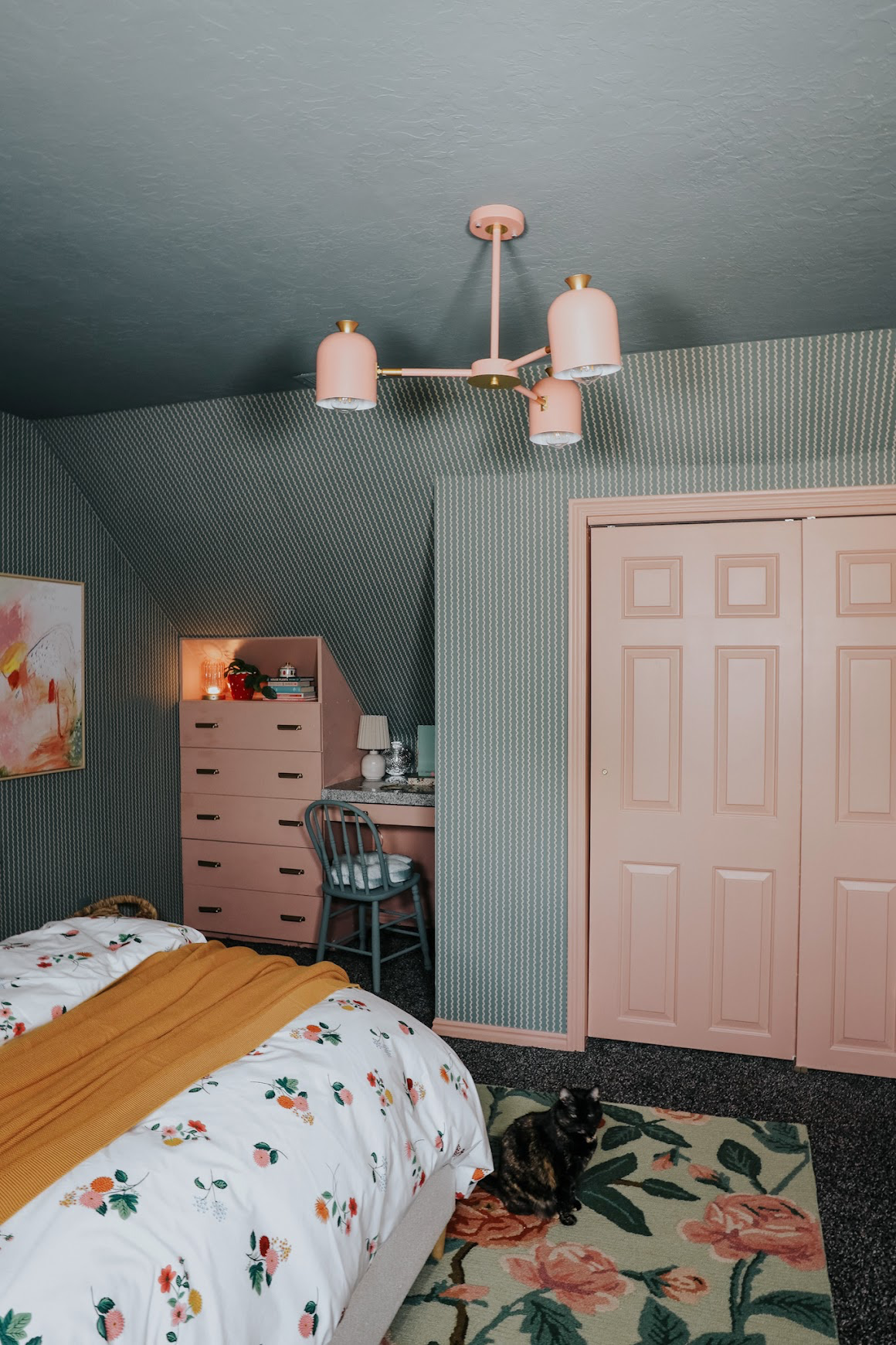 3. Paint Closet Doors Blush Against Muted Green Wallpaper