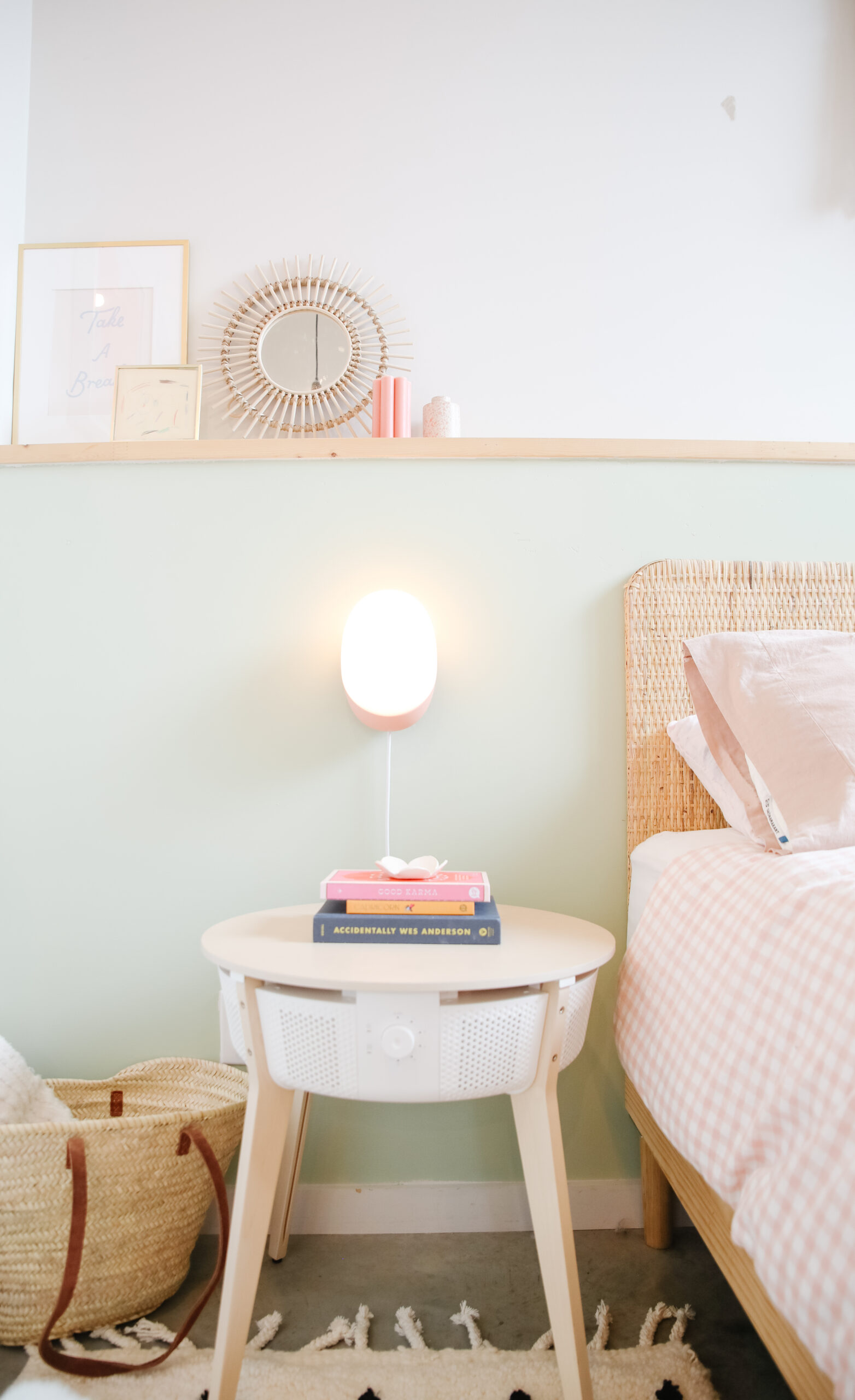 7. Repeat Blush in a Small Wall Light Beside Sage Paint