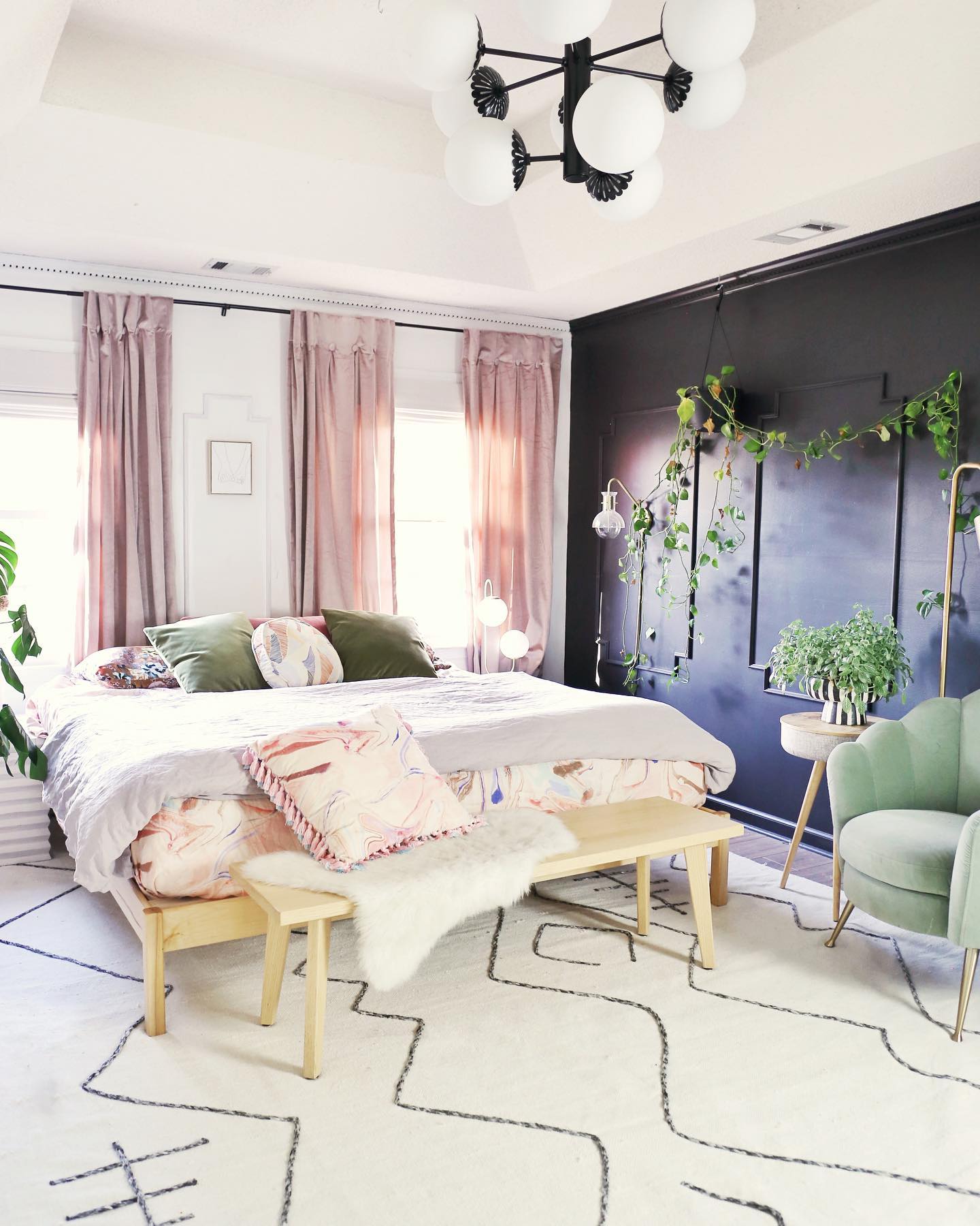 13. Connect Blush Curtains With a Sage Reading Chair