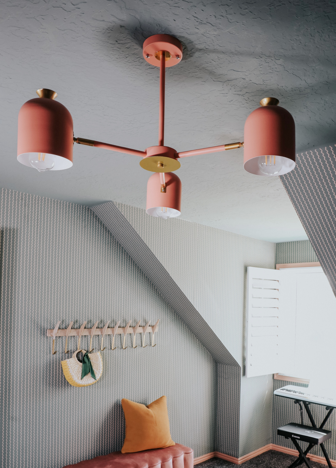 14. Bring Blush Overhead With a Pink Ceiling Fixture