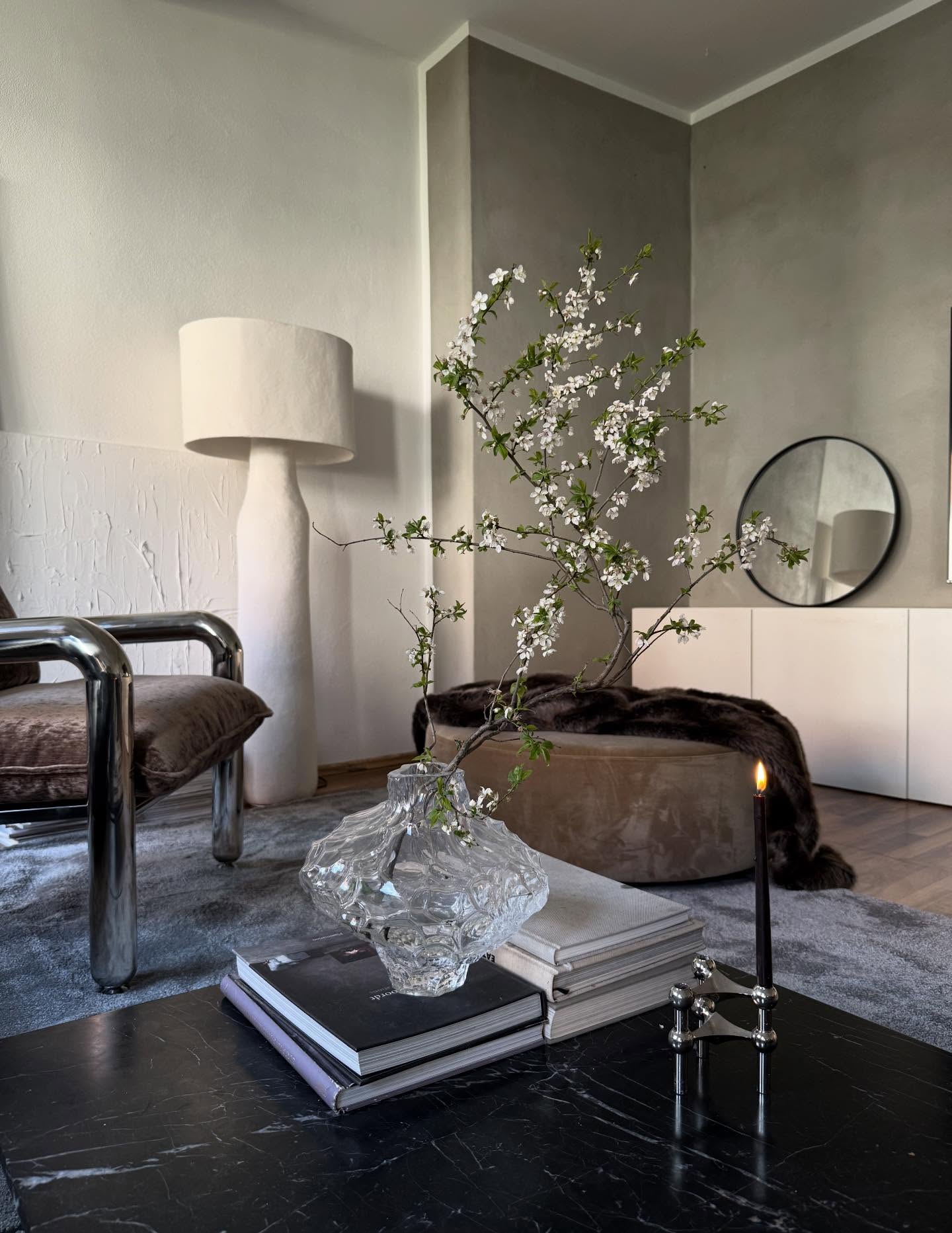 8. Pair Muted Green Walls With Sculptural Seating