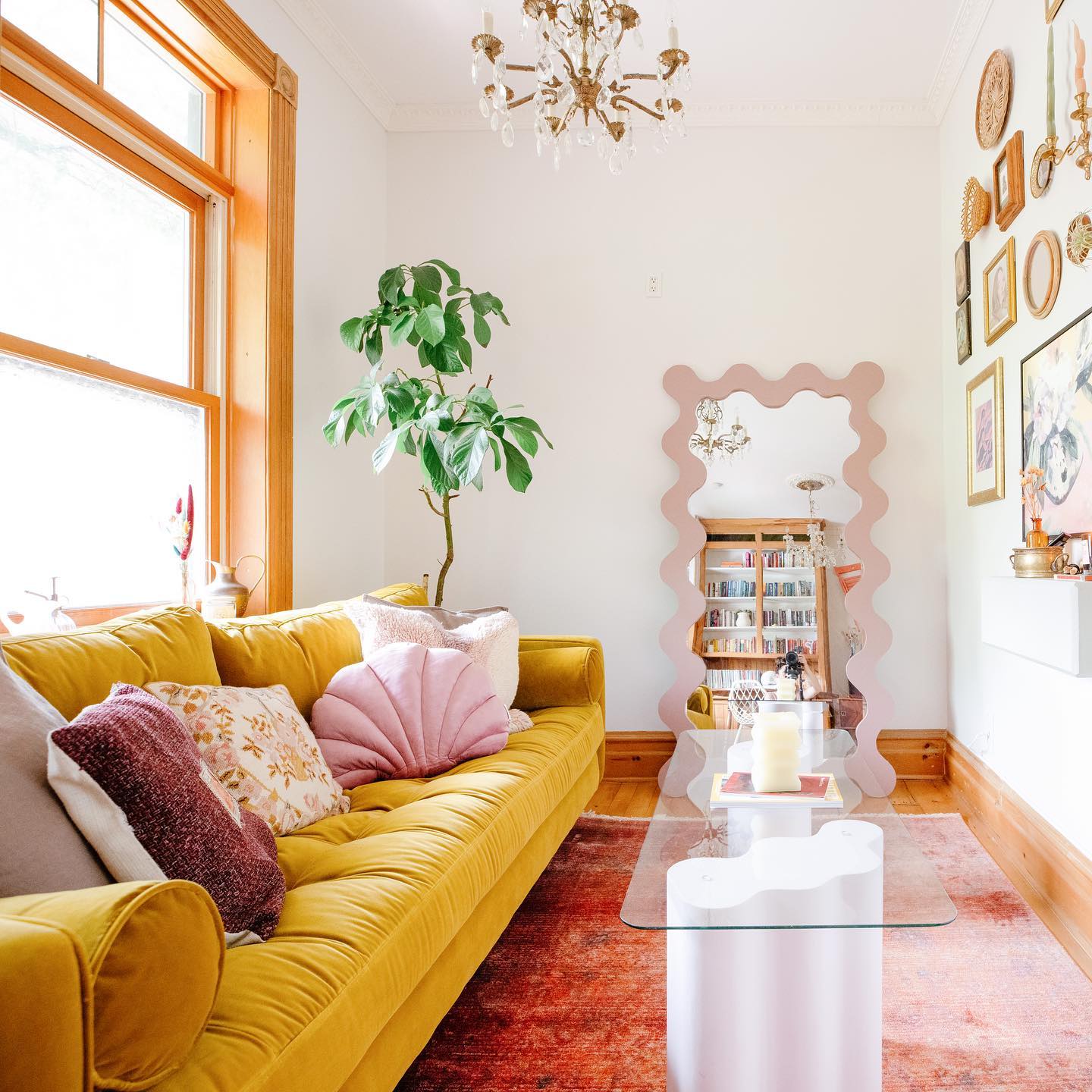 16. Let a Glass Tabletop Keep the Rug Visible