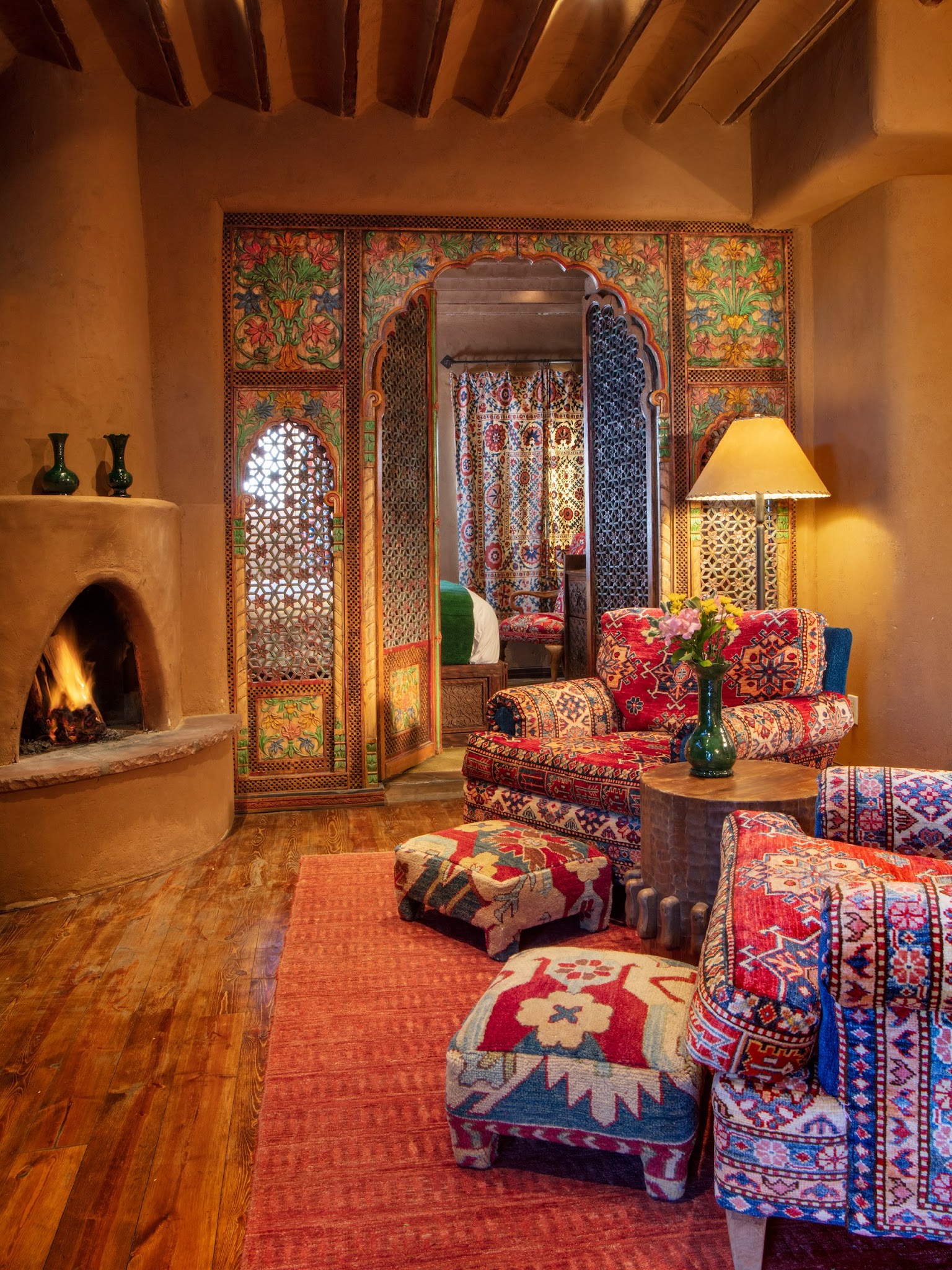 15. Bring Rich Textiles Close to a Kiva Fireplace