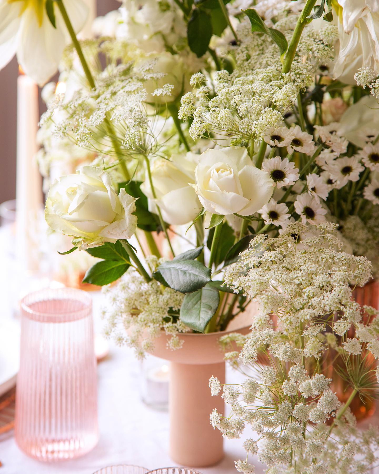 9. Pair Cream Flowers With Soft Pink Vessels