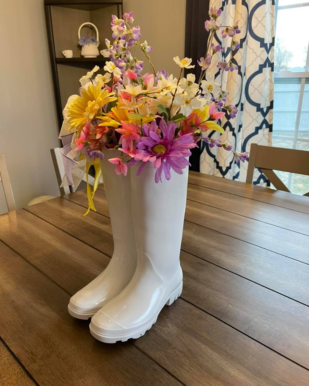 13. Turn Rain Boots Into a Cheerful Flower Holder