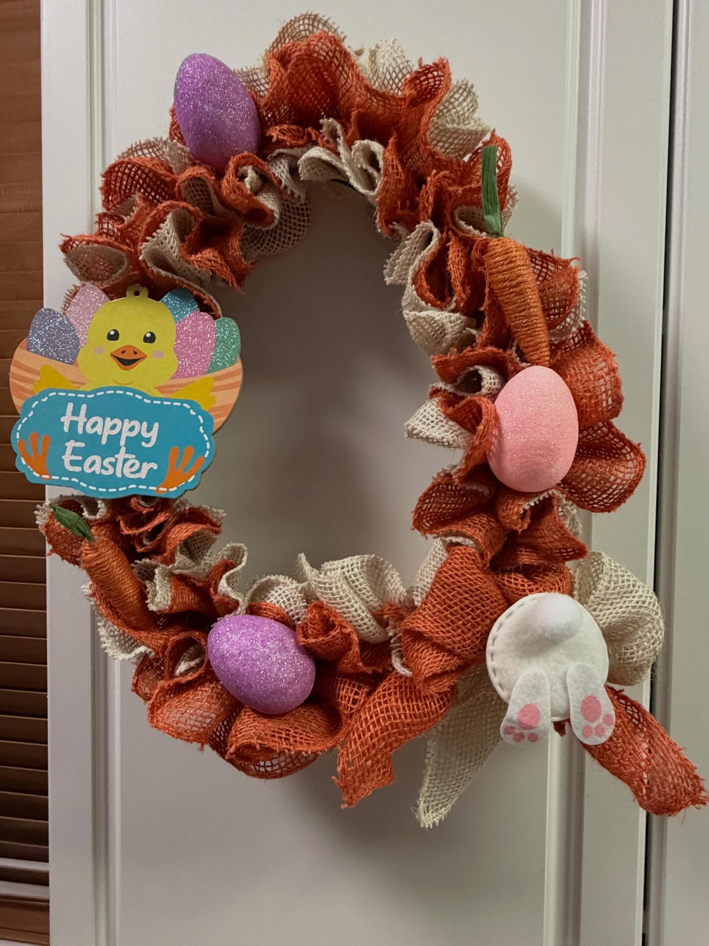 11. Warm Up an Easter Wreath With Orange Mesh