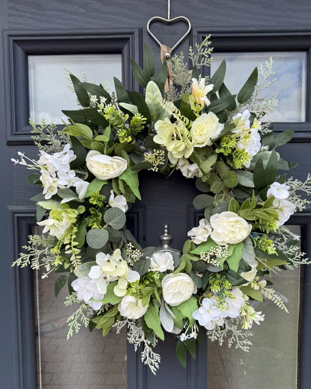 13. Layer Cream Flowers With Several Shades of Green