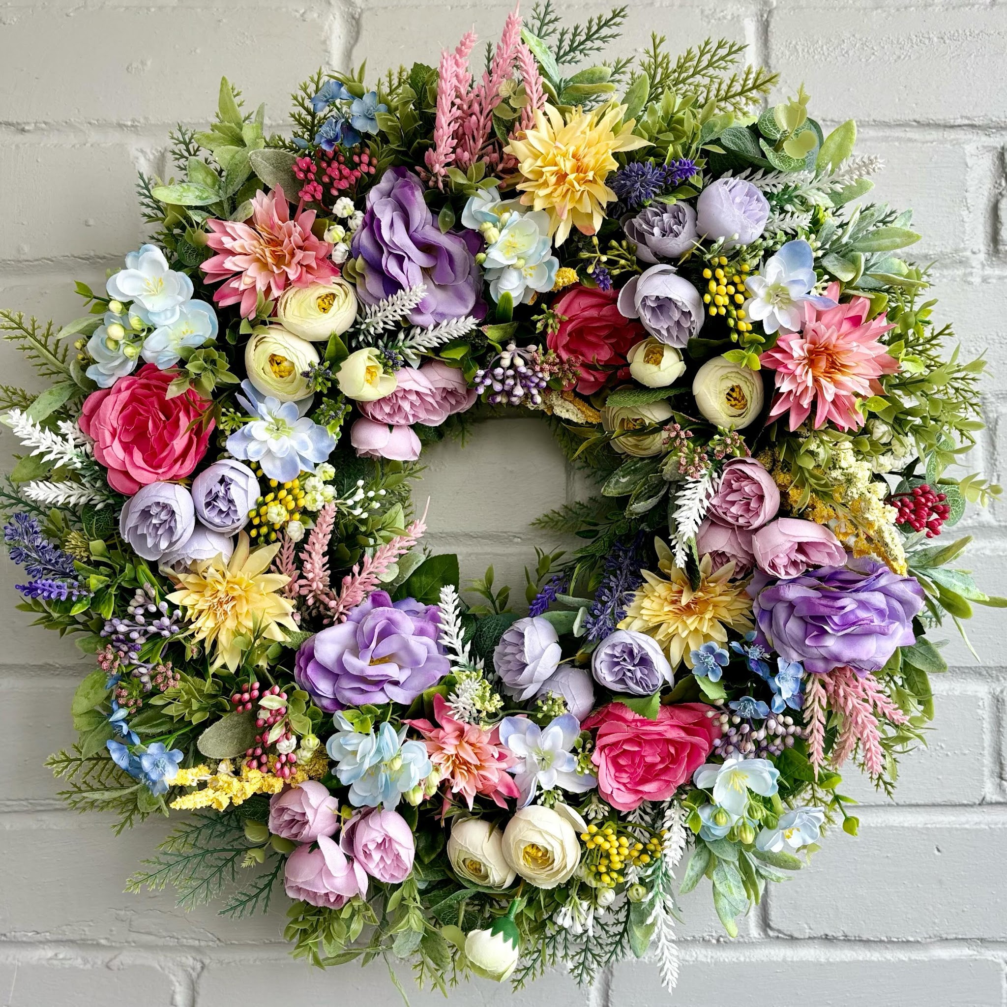 18. Combine Rounded Flowers With Spiky Spring Accents