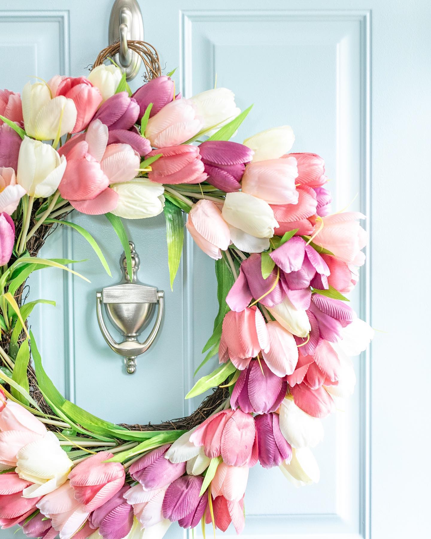 19. Sweep Pink Tulips Around a Blue Door