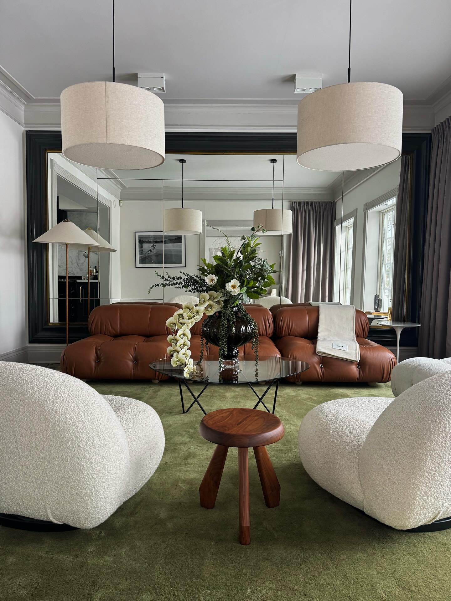2. Refresh a Leather Seating Group With a Green Rug