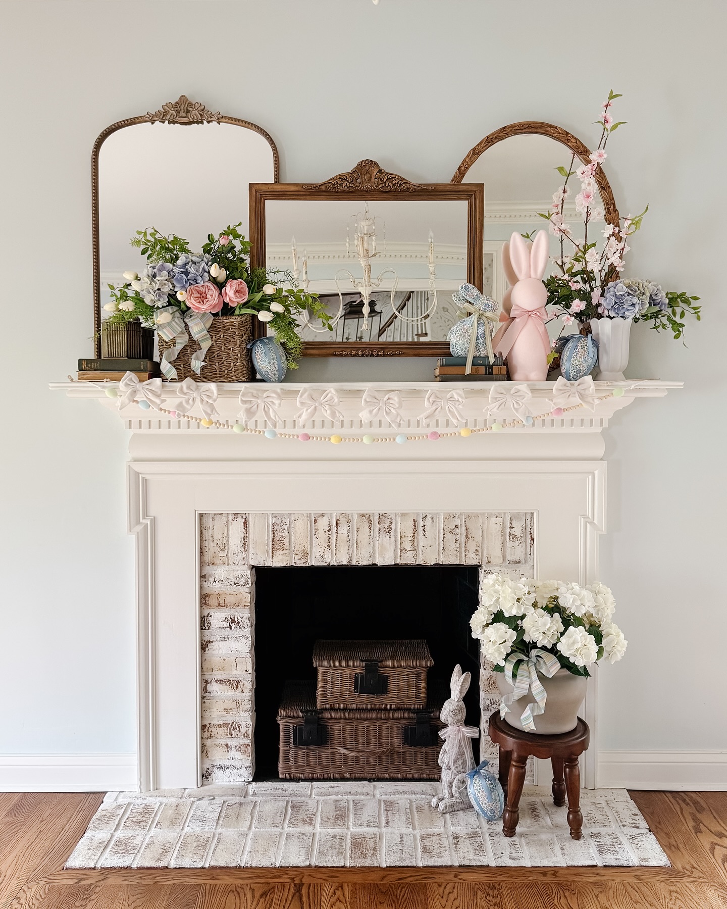 6. Layer Three Mirrors Behind Pastel Flowers
