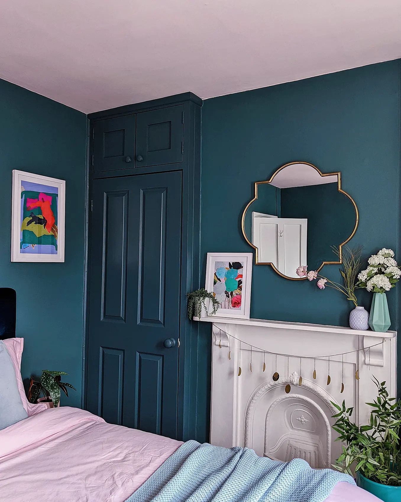 19. Set Pastel Flower Vases Against a Deep Wall Color