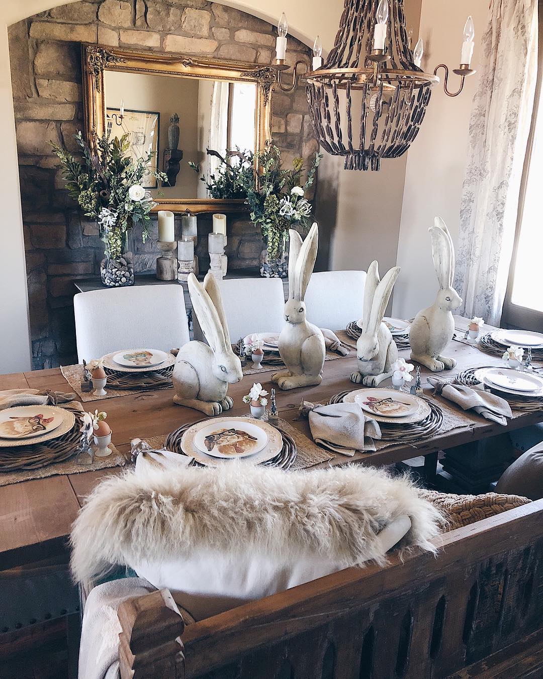 2. Pale Sculptural Accents on a Bare Wood Table