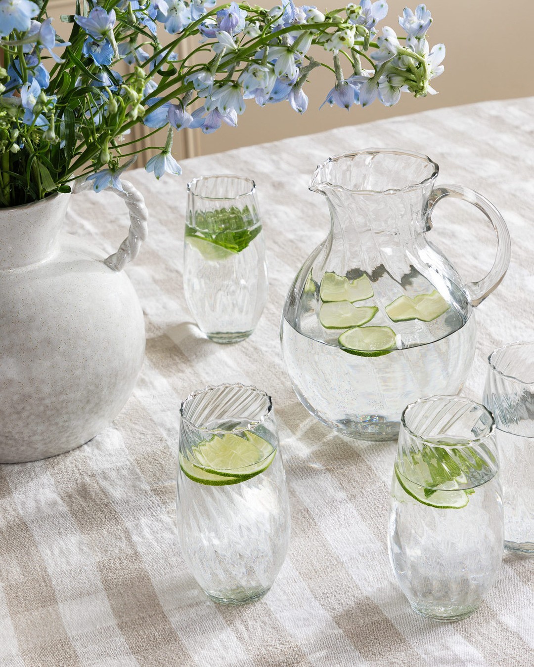 13. A Clear Pitcher with Fresh Citrus Slices