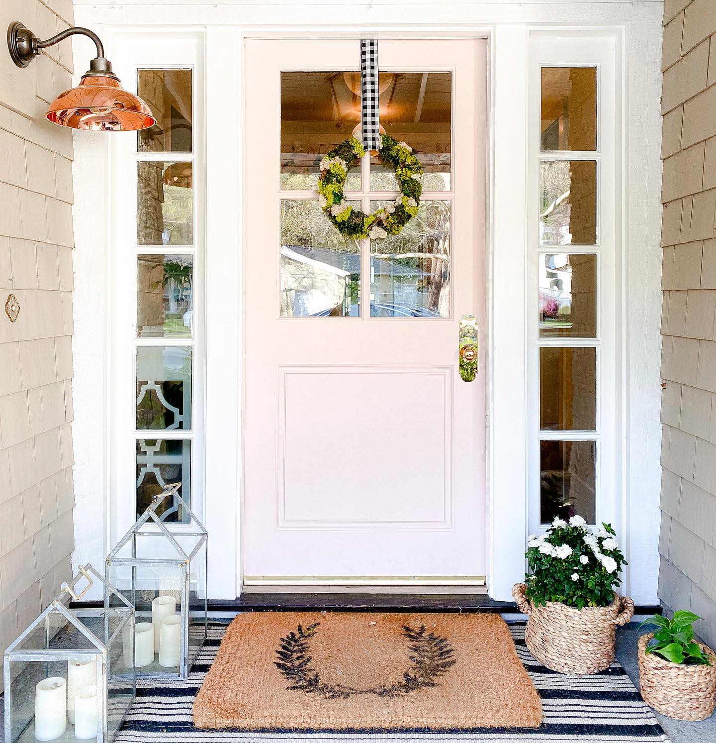 2. A Small Green Wreath on a Pink Door
