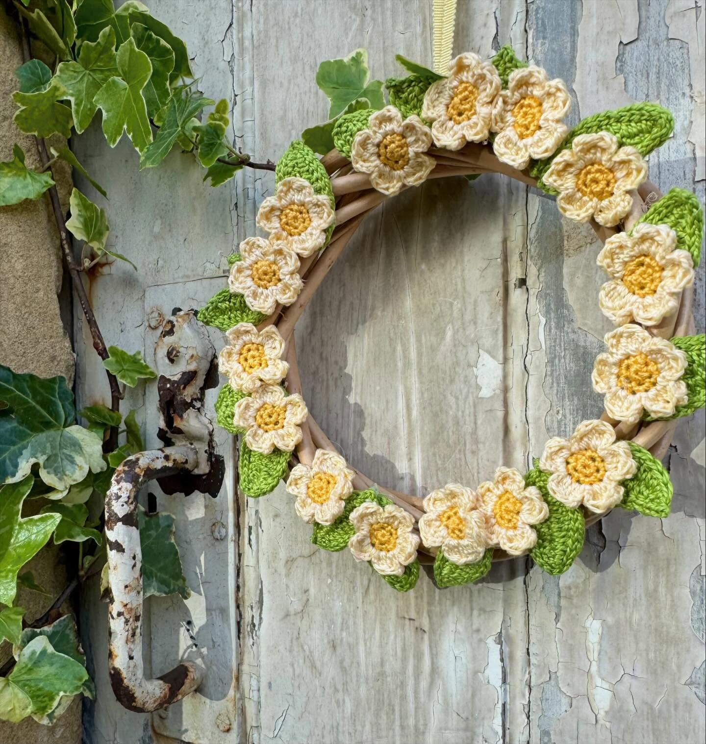 4. Crocheted Flowers on Weathered Wood