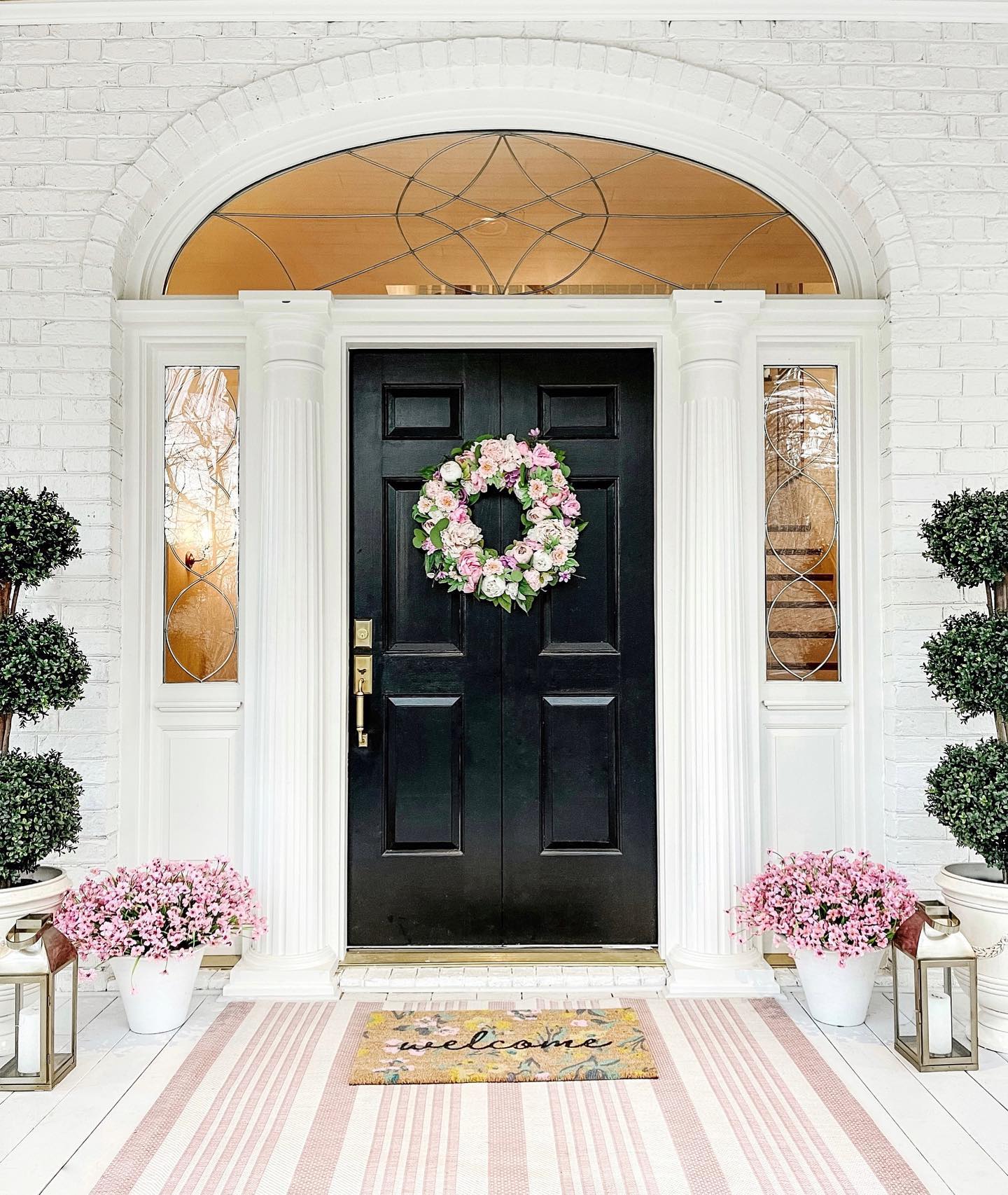 14. Pink Flowers Repeated Across the Entry