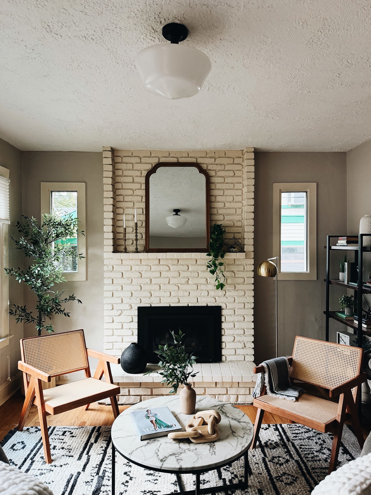 8. Taupe Walls Behind a Cream Brick Fireplace