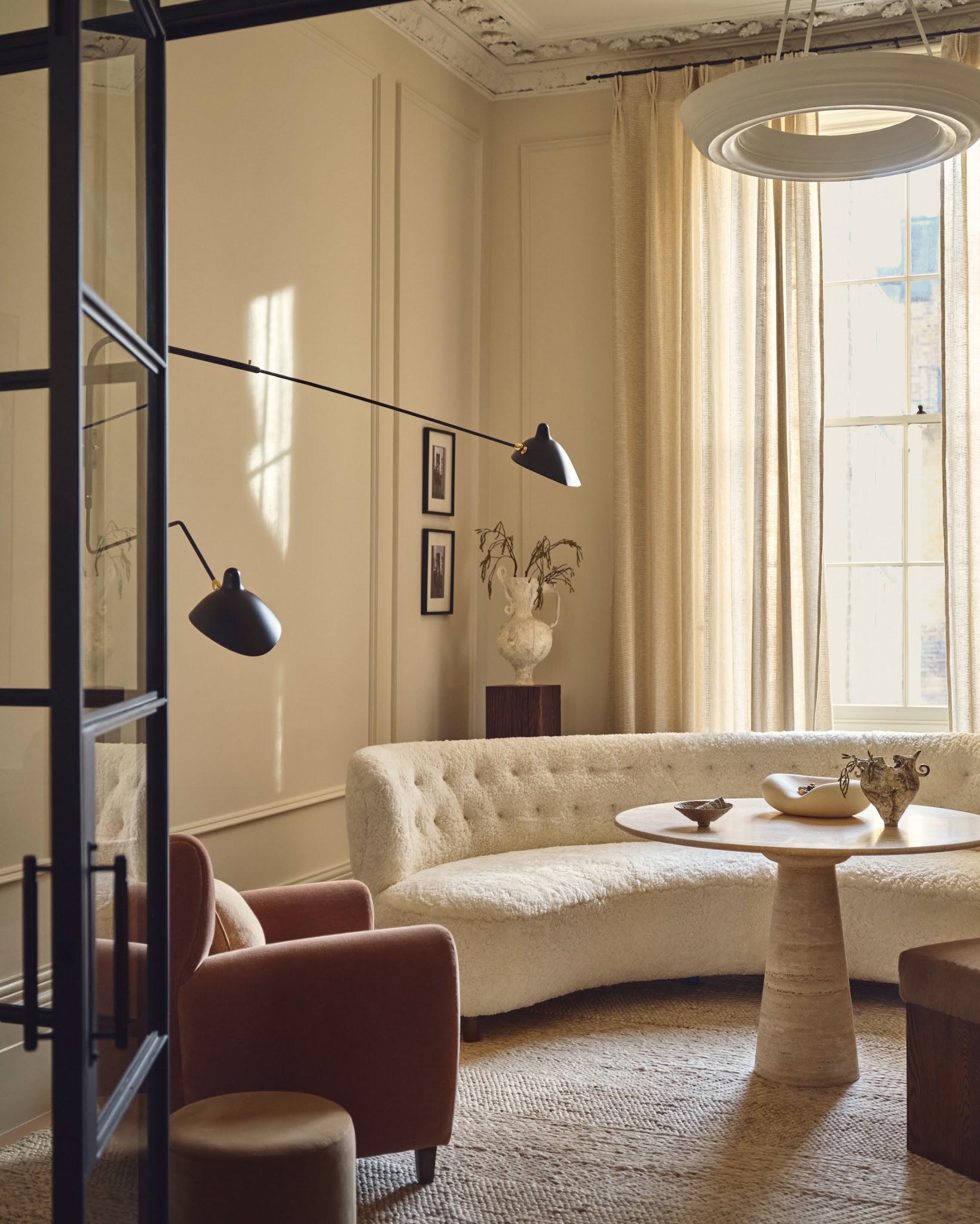 11. Let a Rust Armchair Warm a Cream Seating Group